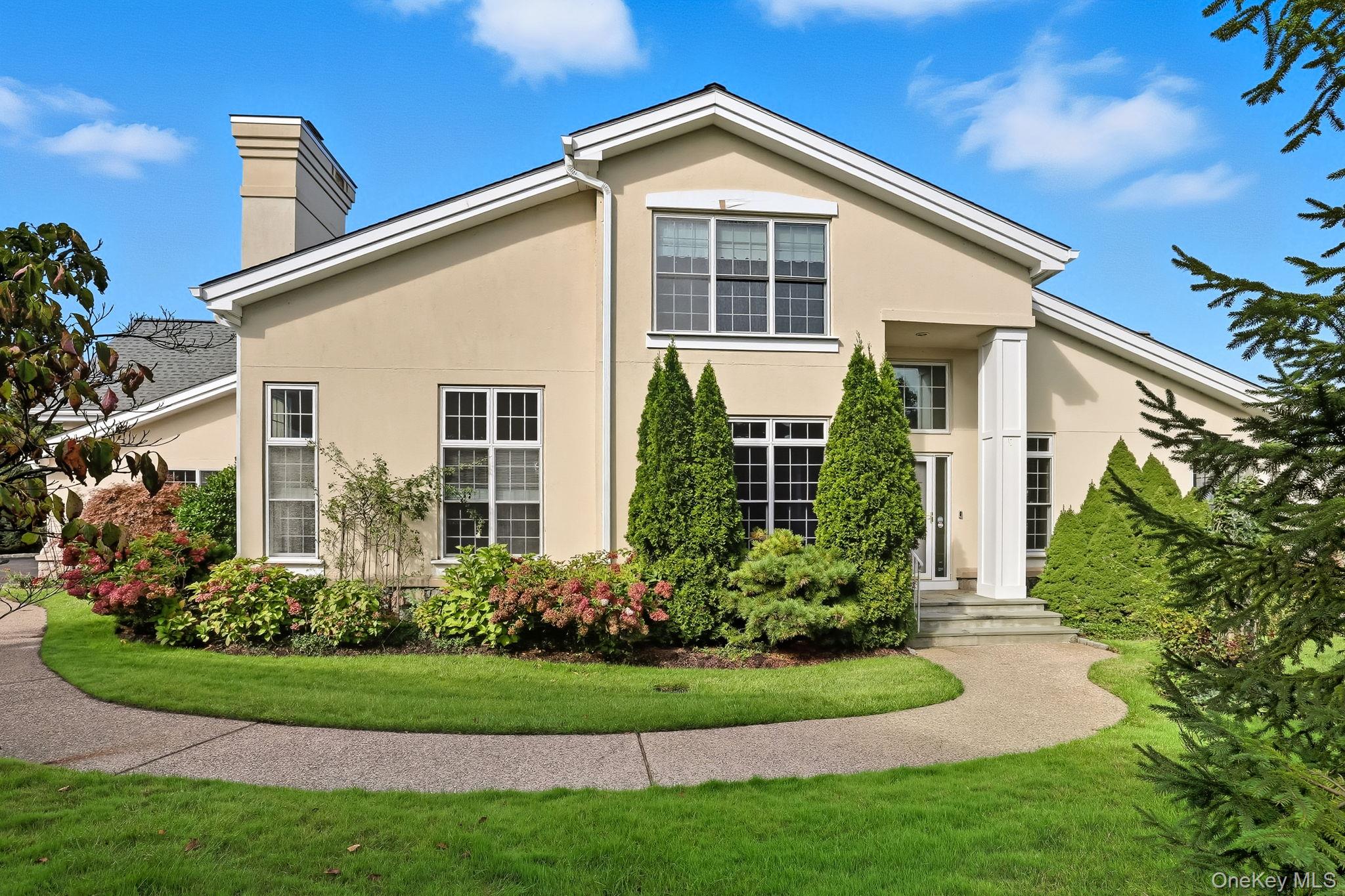 This spacious Doral Greens townhouse features a desirable first-floor...