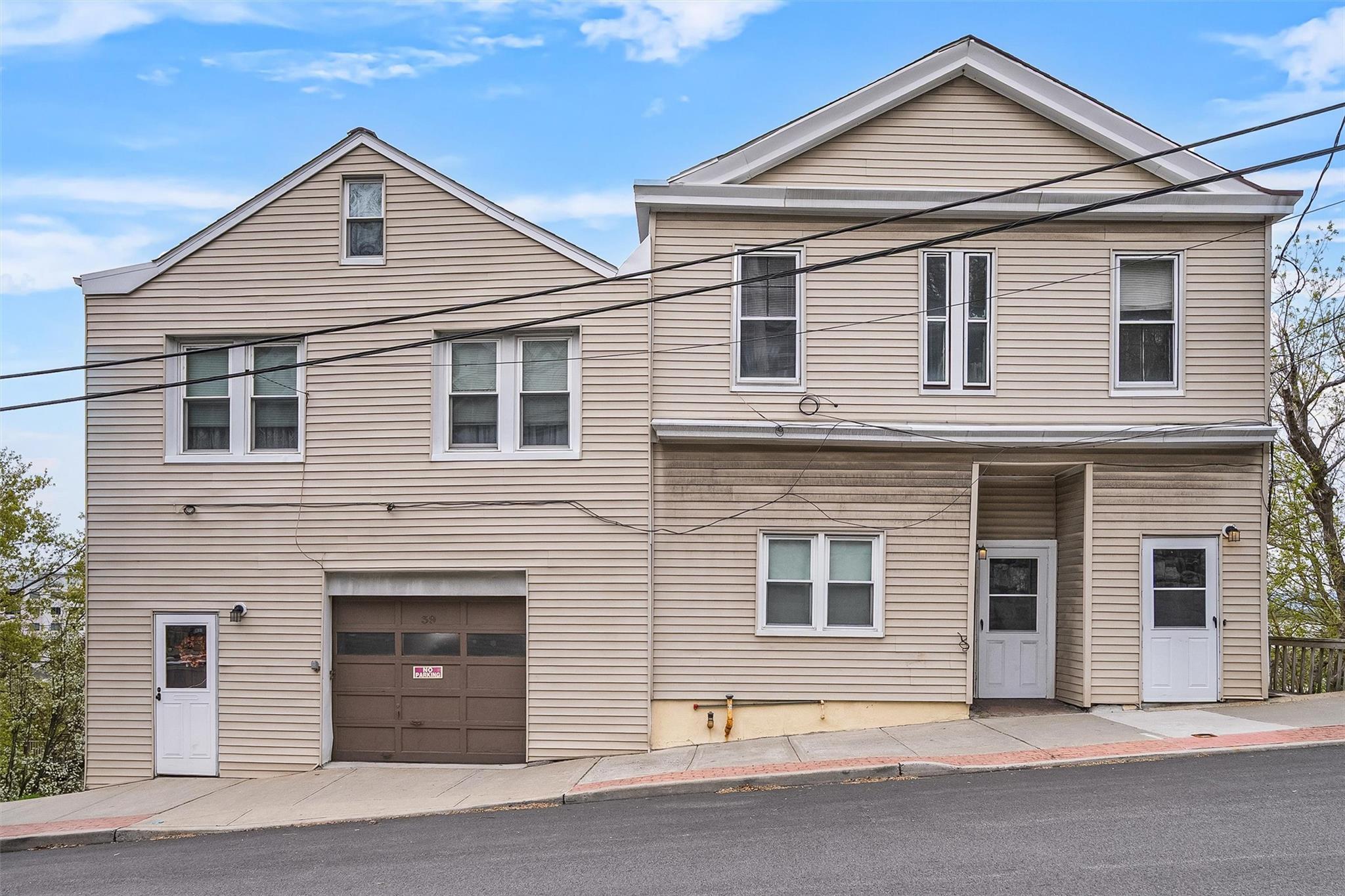 A Multi Family and Single family being sold as a package. Left side is...