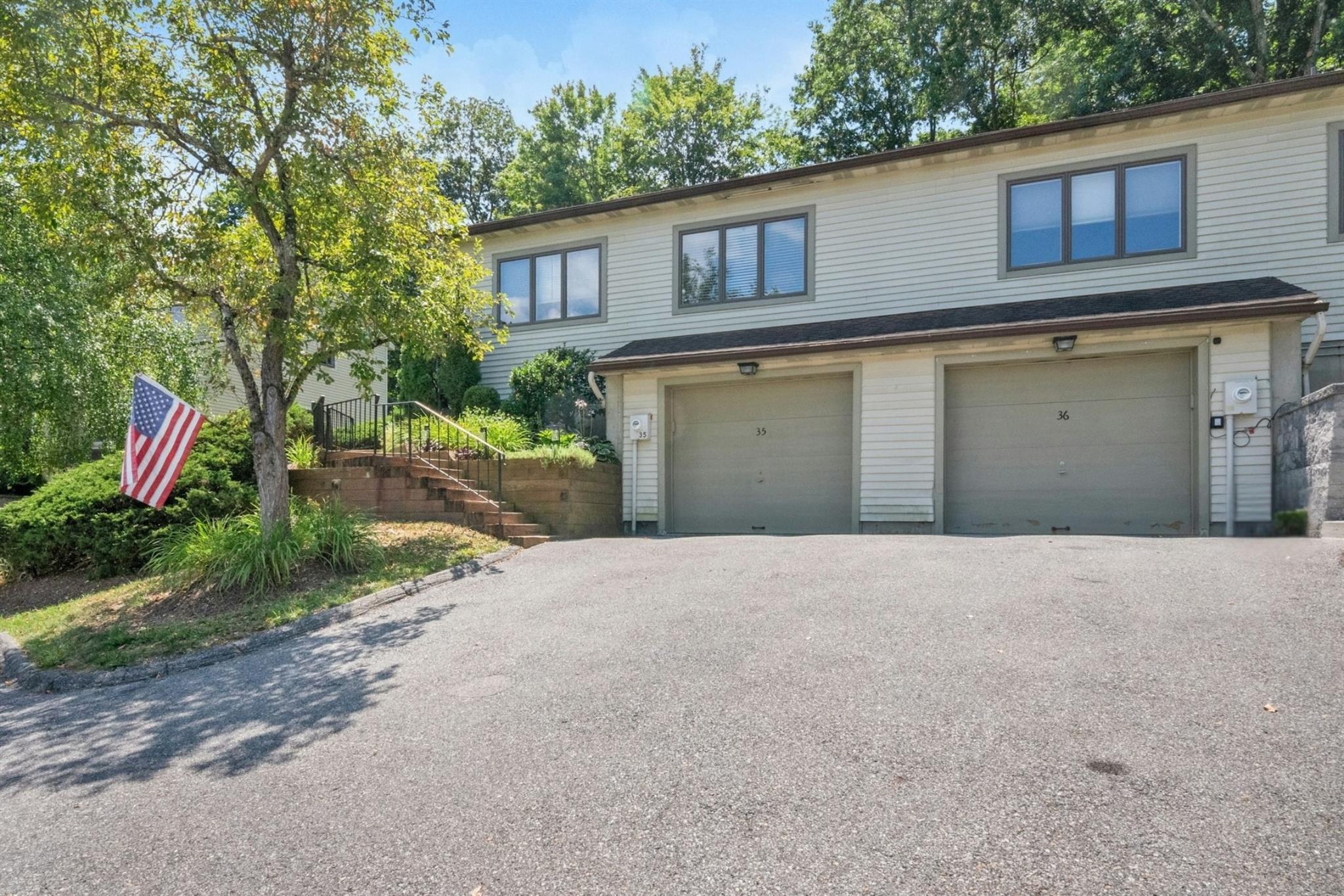 Move right into this sun-filled, beautiful END unit with an attached g...