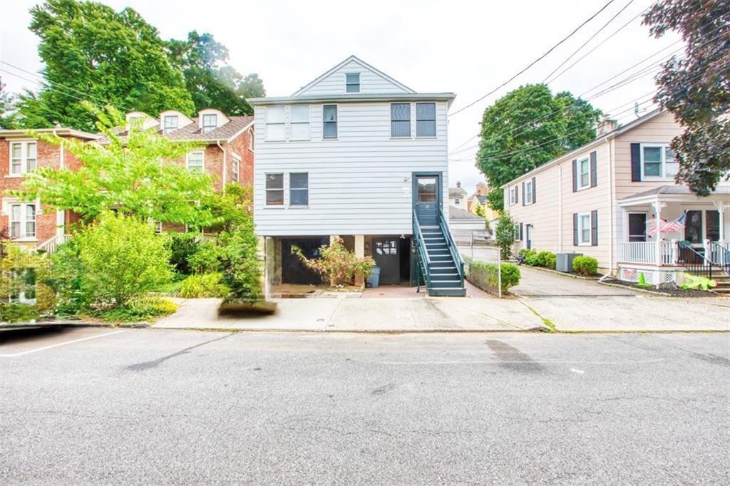 Located on one of the most peaceful corners of downtown Irvington yet...