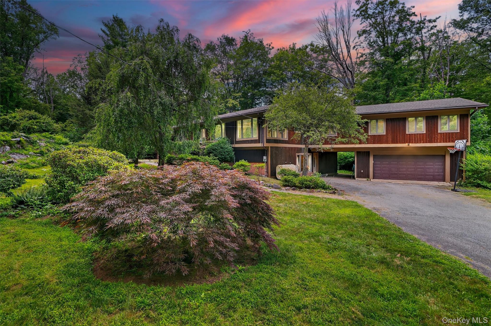 Spacious, private, and filled with possibility, this split-level conte...
