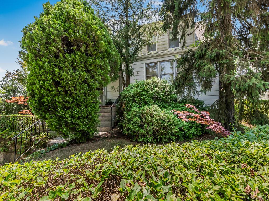 Legal two family home on oversized lot in a most convenient location....