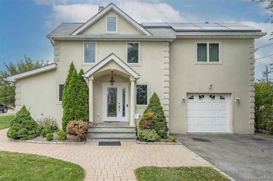 Highly desirable Eastchester 5-bedroom Colonial that offers an open fl...