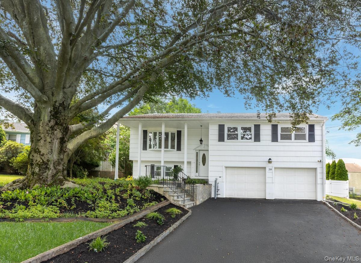 Located on a lovely level .20-acre property in Dobbs Ferry, this spaci...