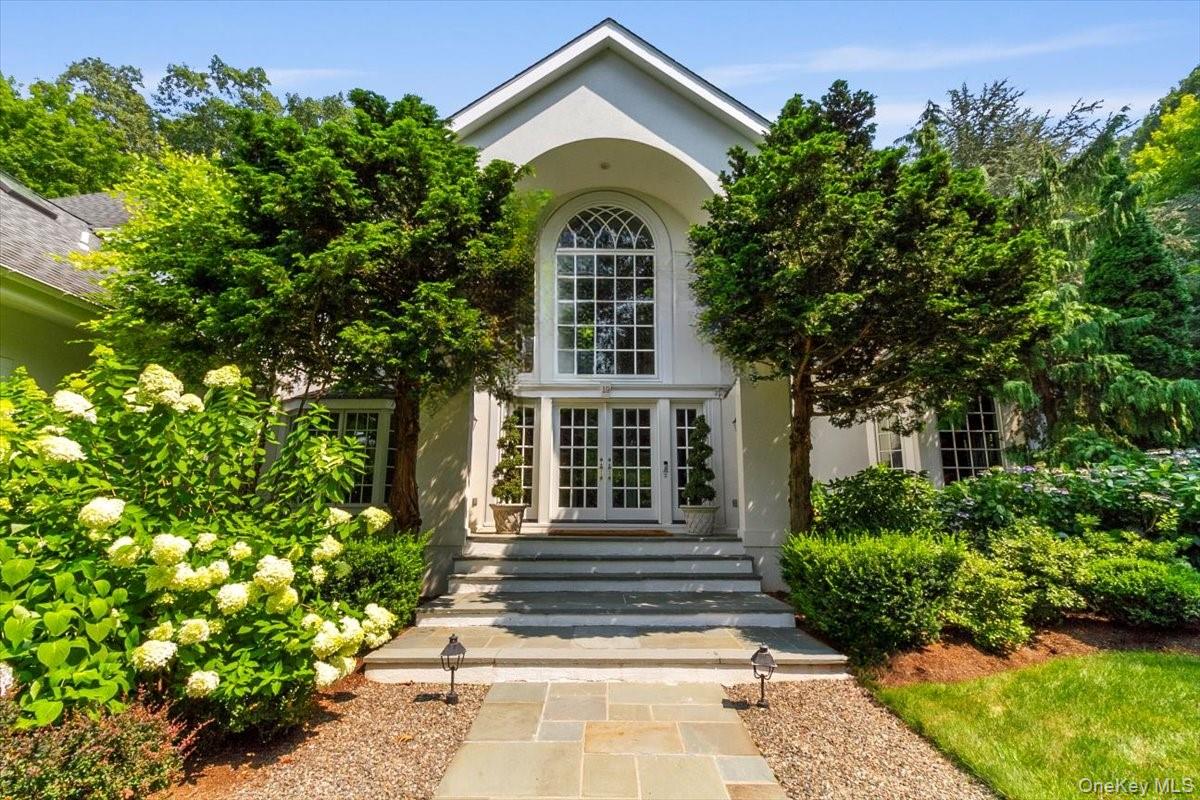 Experience refined living in this Masterpiece of Design and Detail.  B...