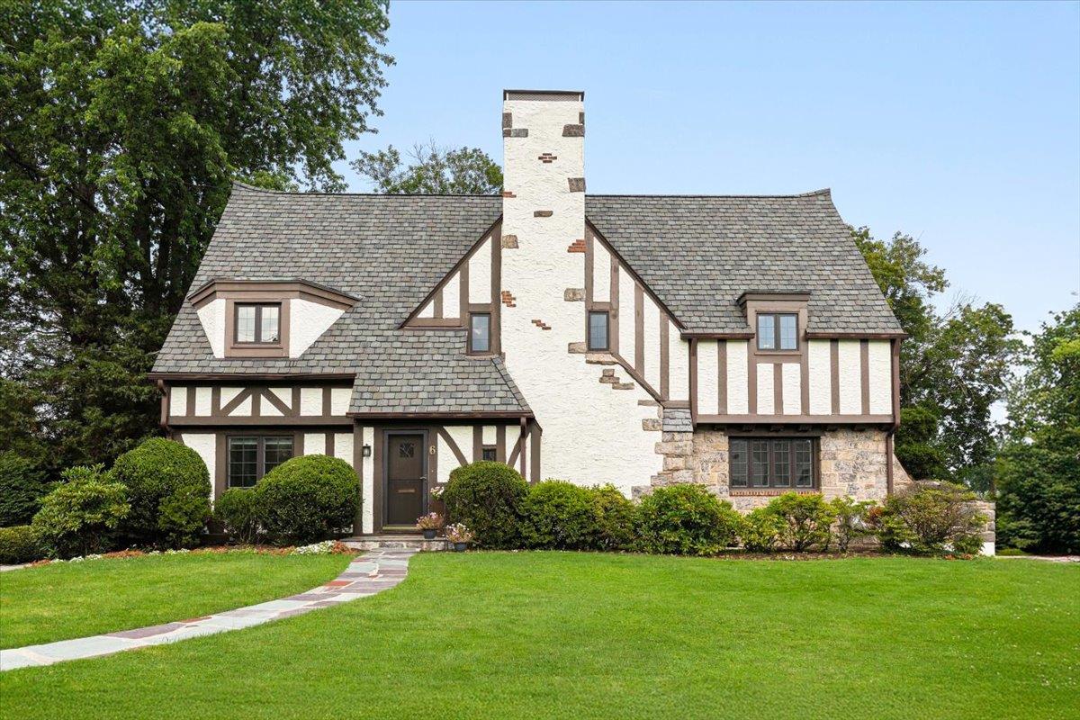 Tucked away on a quiet, tree-lined street in the heart of Gedney Farms...