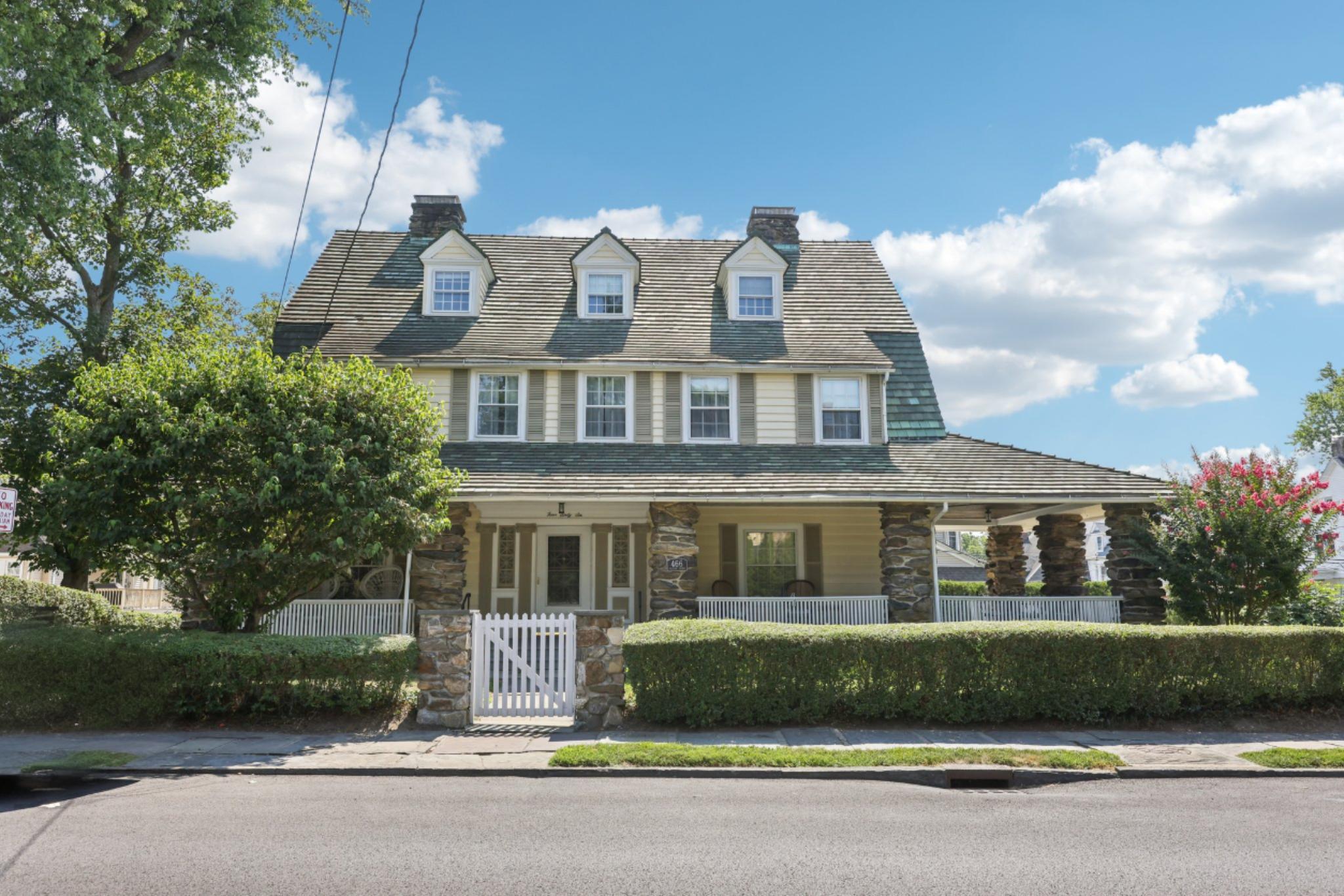 Welcome to this majestic 1910 Colonial, a true architectural gem offer...