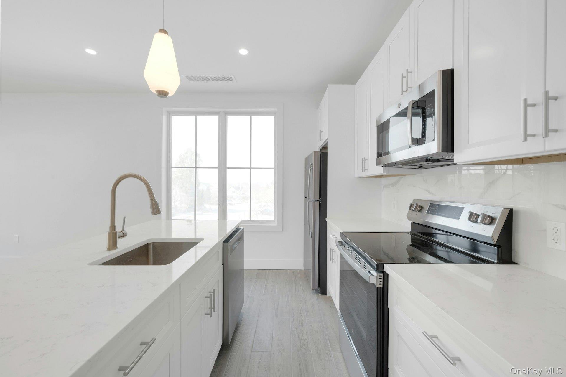 NEW CONSTRUCTION....Be the FIRST to Experience Contemporary Living in...