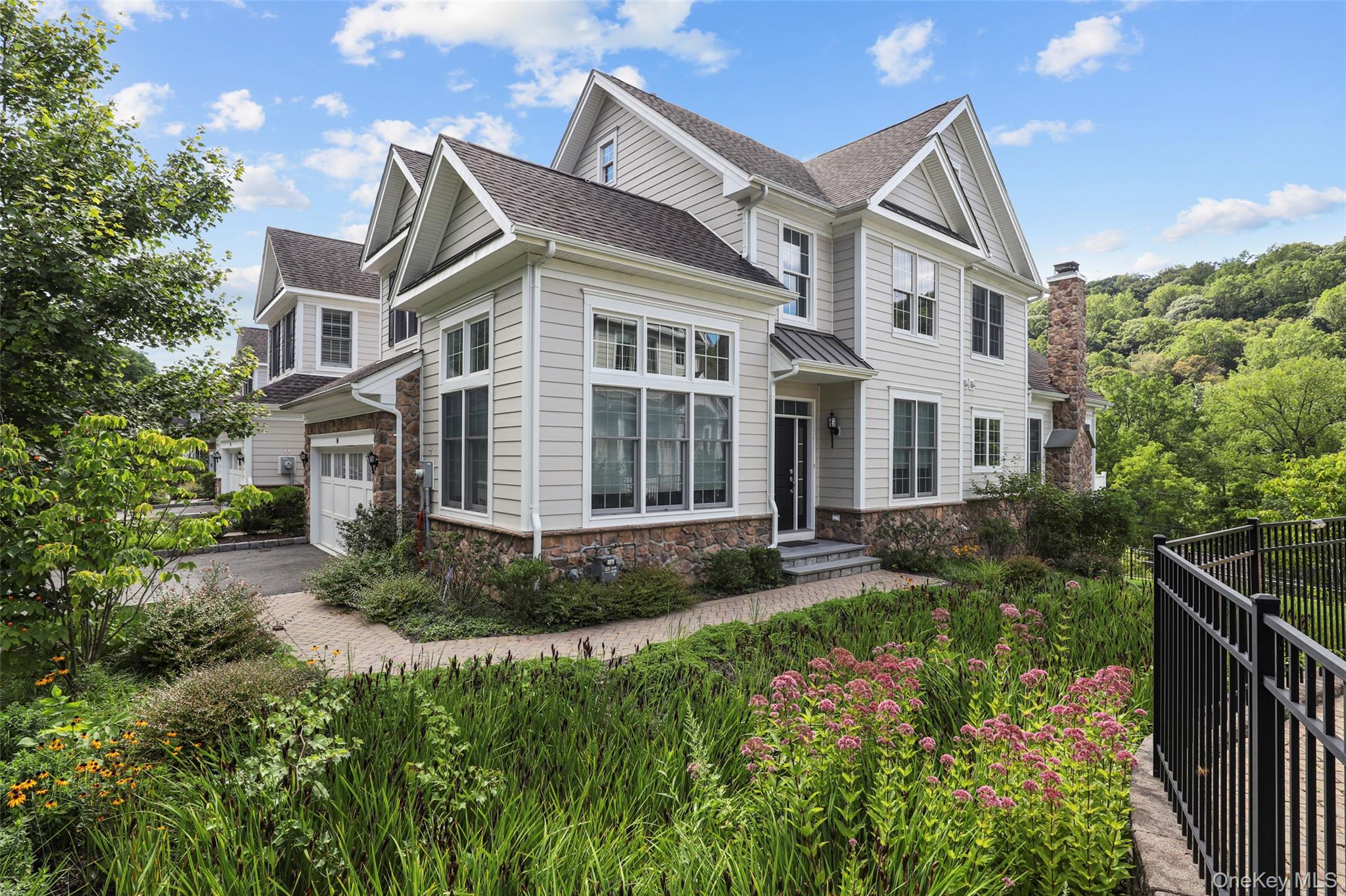 Set privately in the highly sought-after Enclave neighborhood, this be...