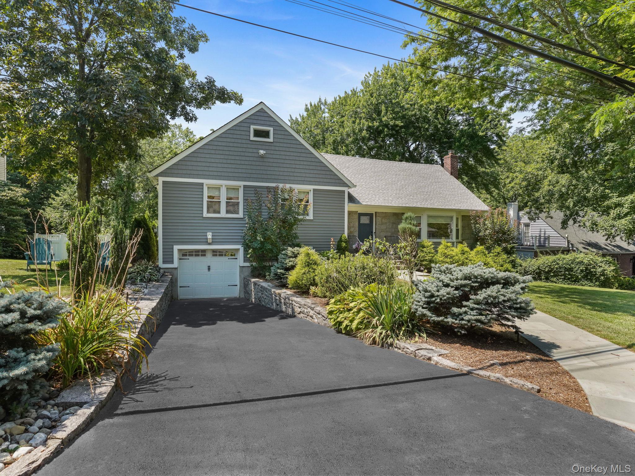 Pretty in Pinebrook Estates! Luxuriously updated throughout--this mult...