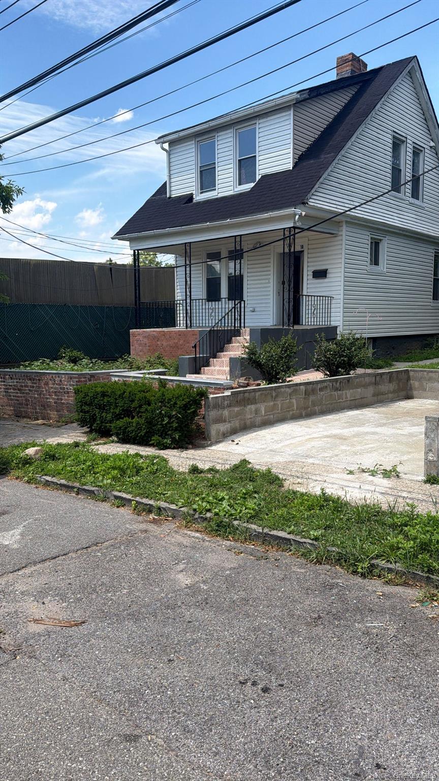Welcome to this Colonial-style single-family home located on a residen...