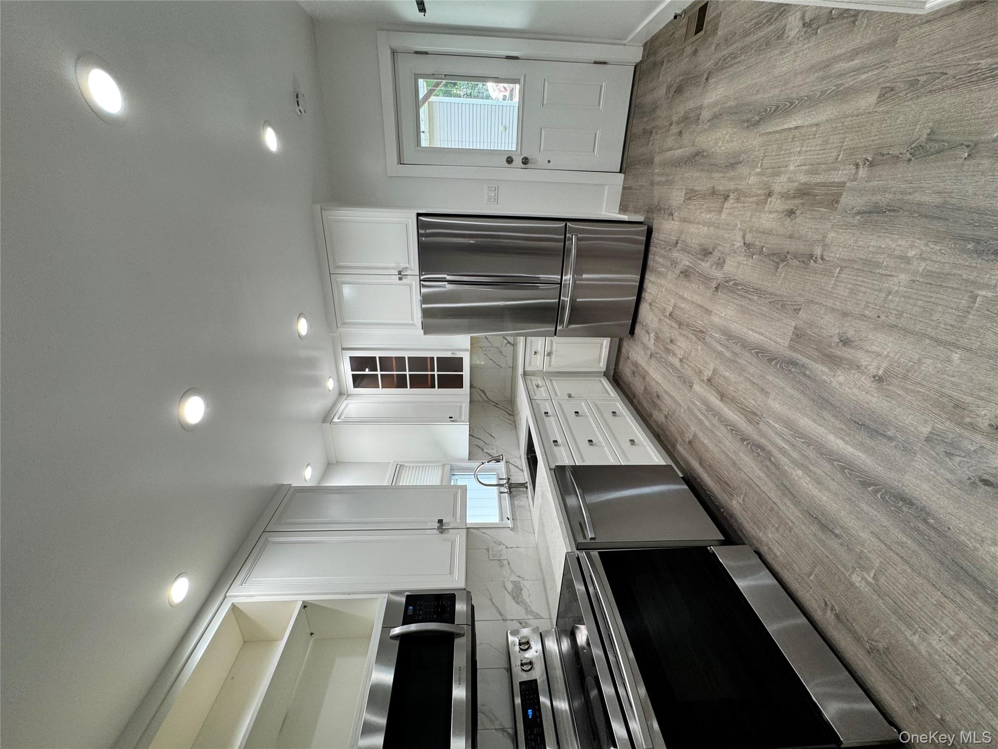Welcome to this beautifully renovated first-floor rental in the award-...