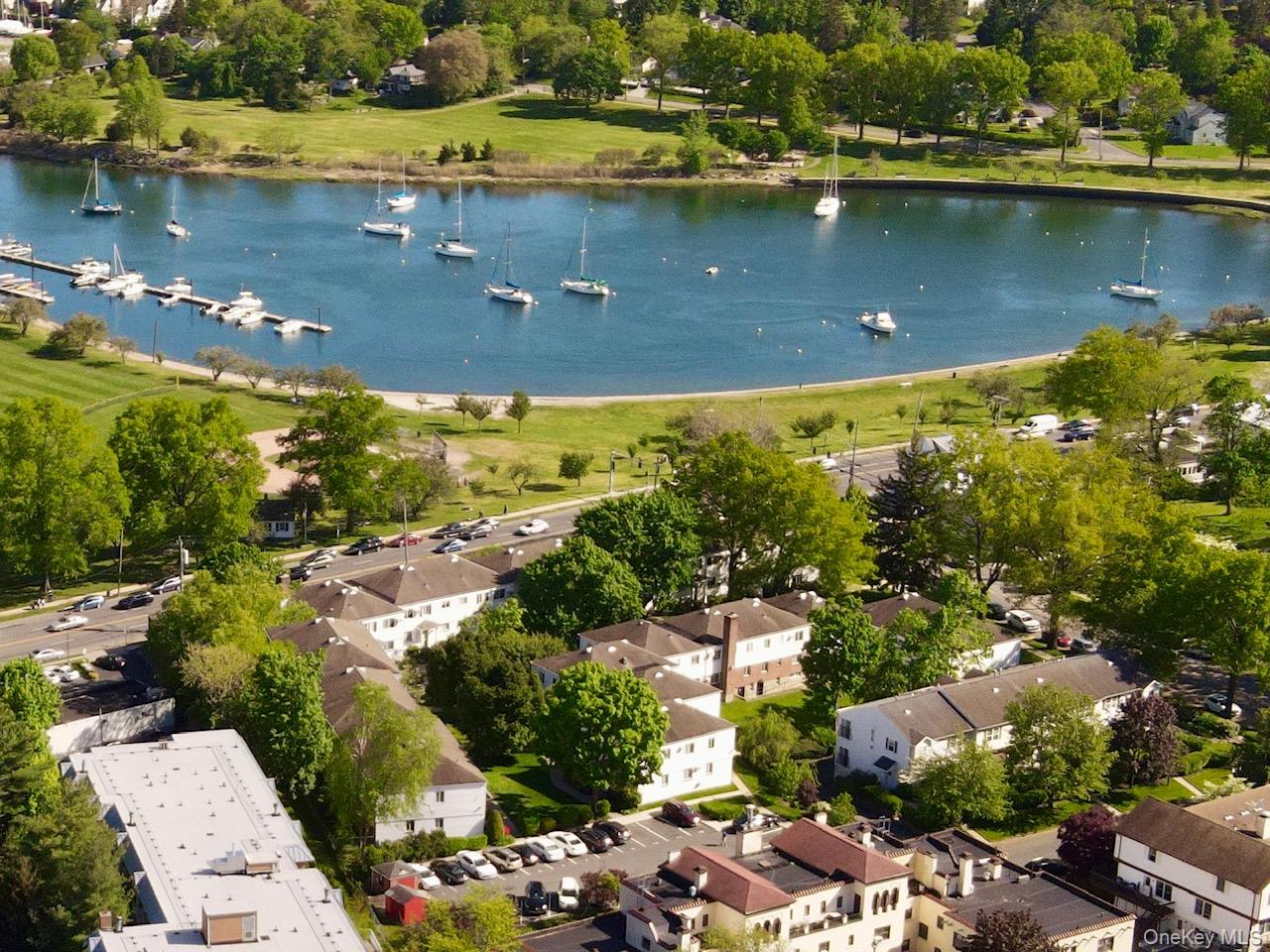A Rare Find with Water Views of Mamaroneck Harbor! Welcome to this lig...
