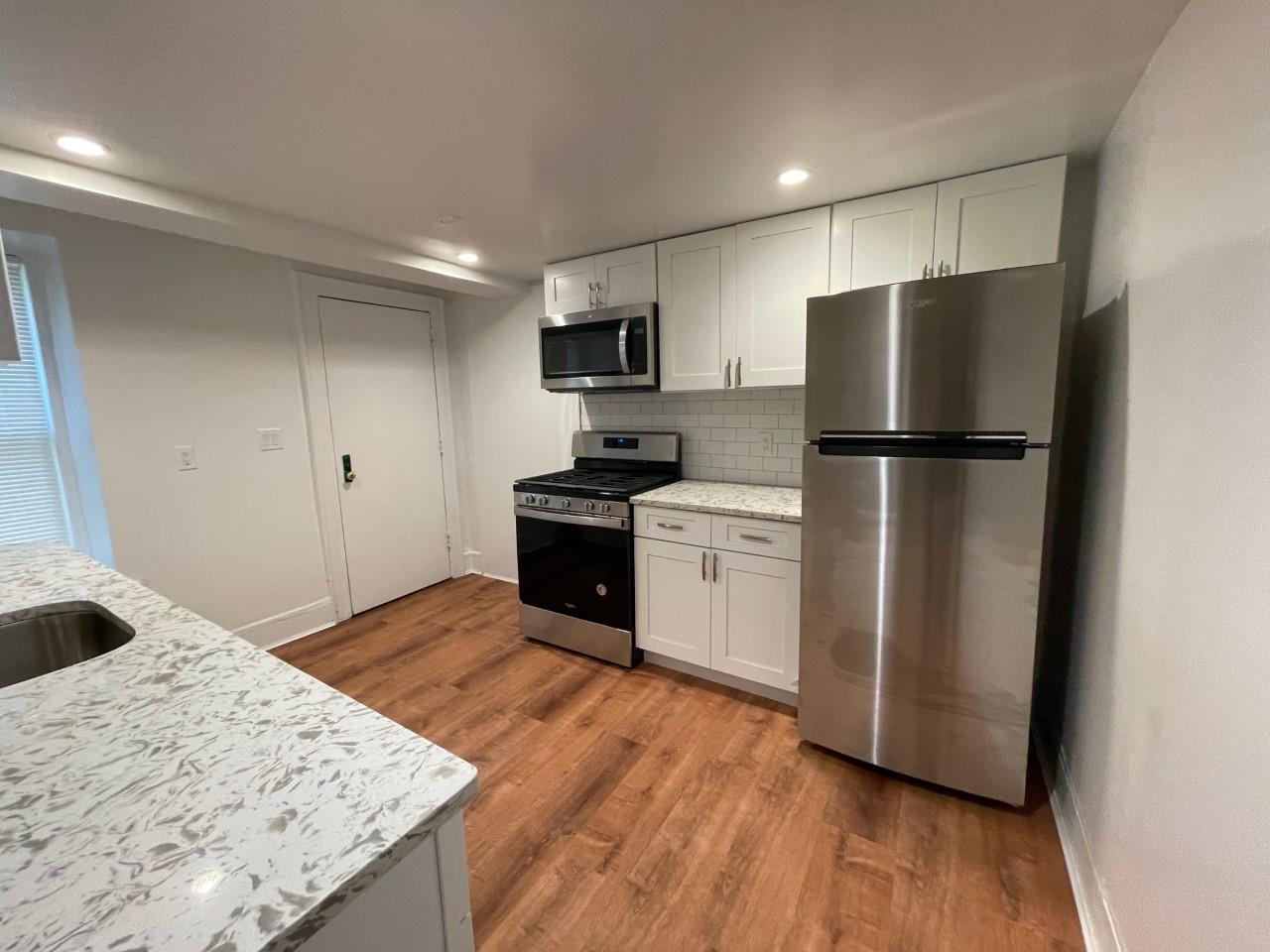 Remodeled 4 rooms, 2 bedrooms, spacious living room and an updated kit...