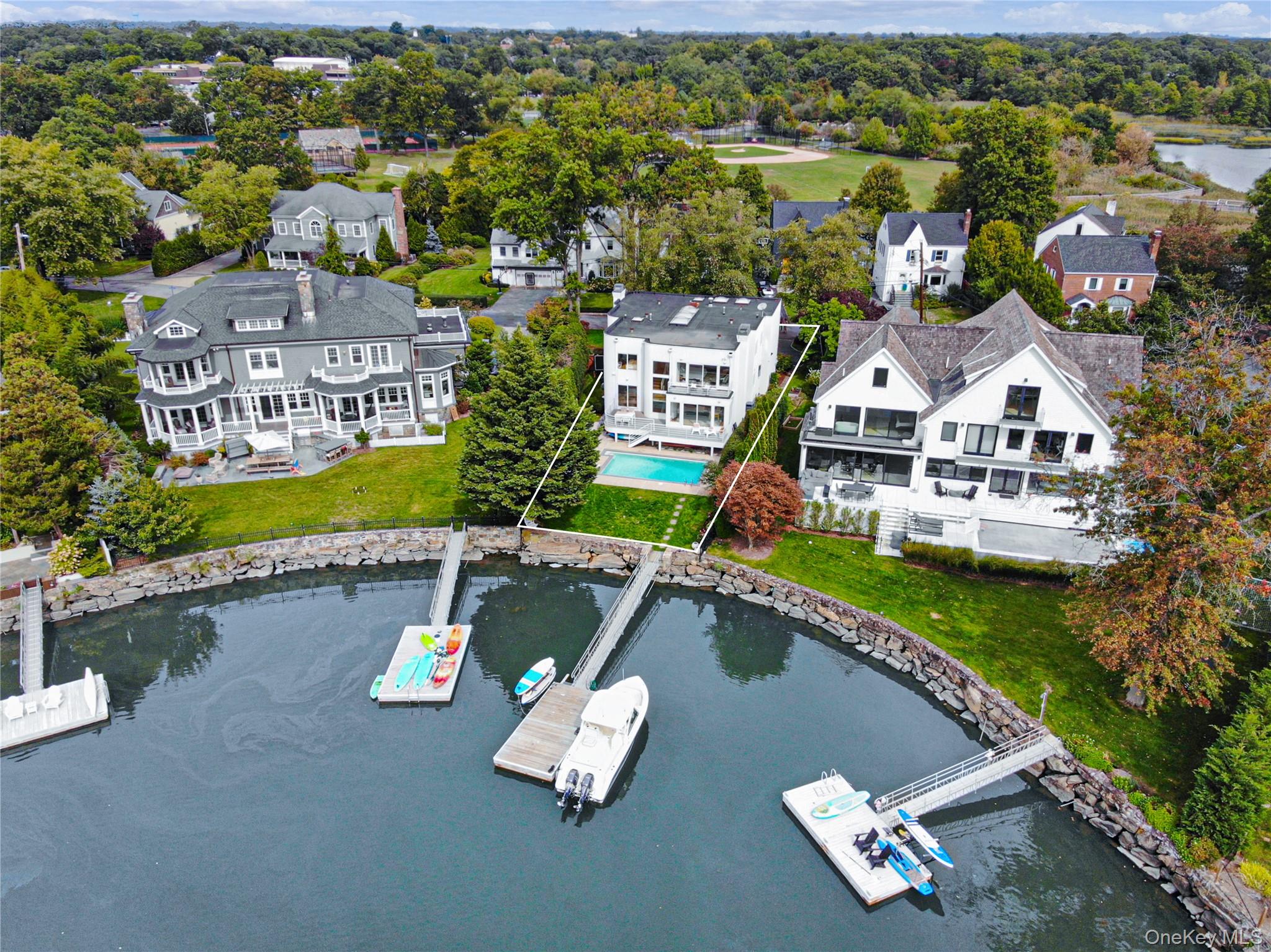 Welcome to modern waterfront living in the heart of Larchmont Manor, i...