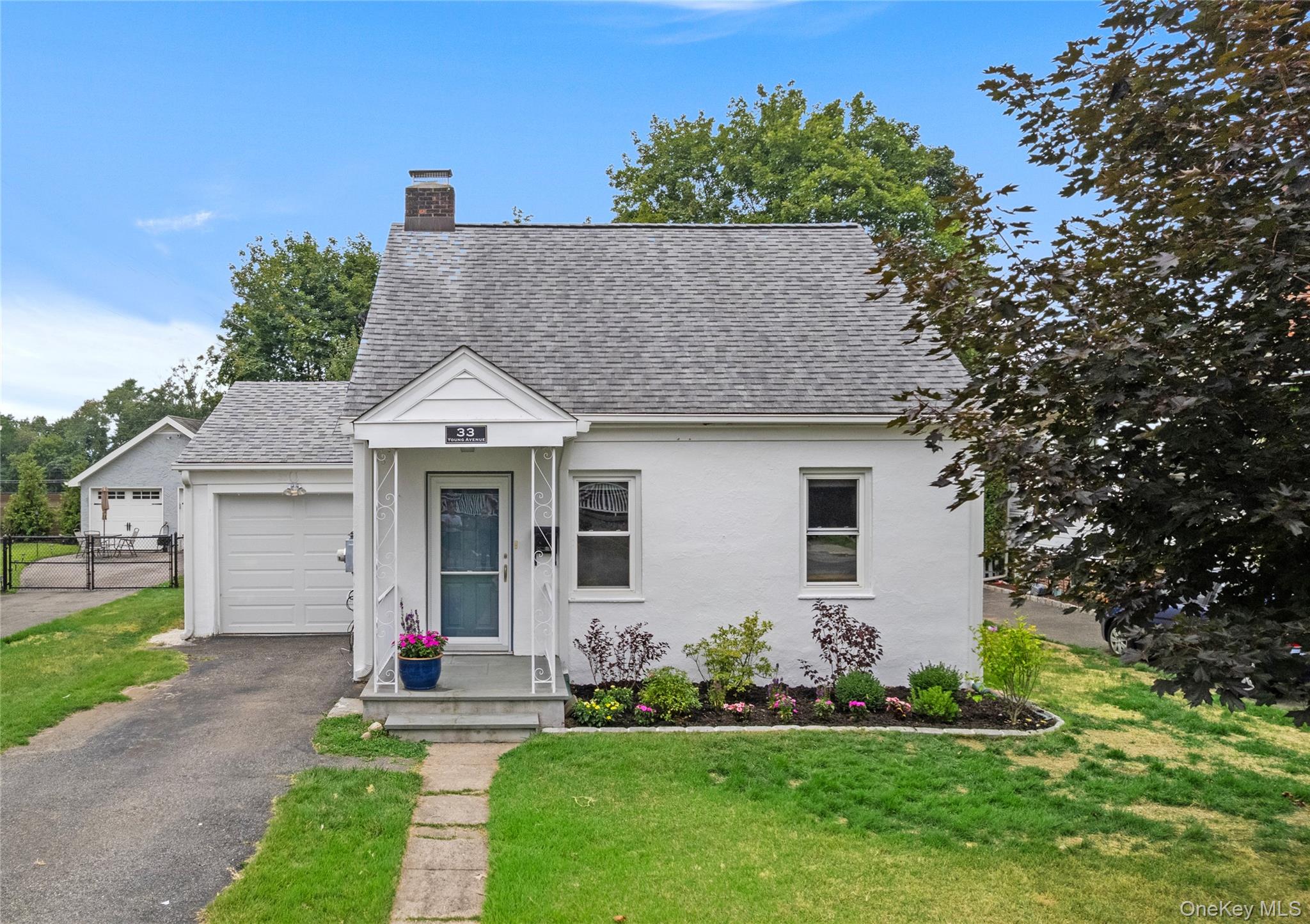 Welcome to 33 Young Avenue – a picture-perfect, move-in ready home loc...
