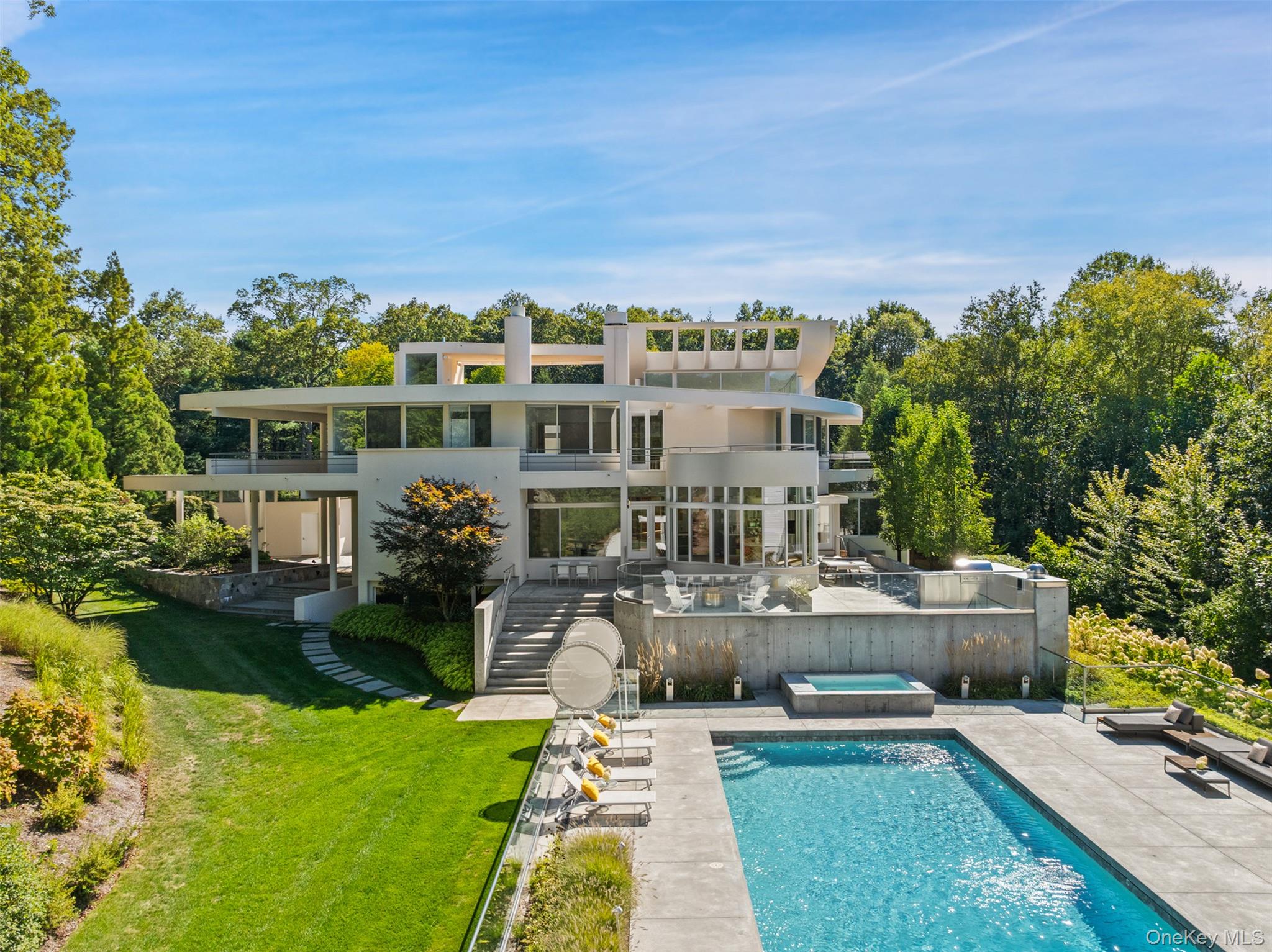 A MODERN MASTERPIECE - Impressive and dramatic with soaring ceilings,...