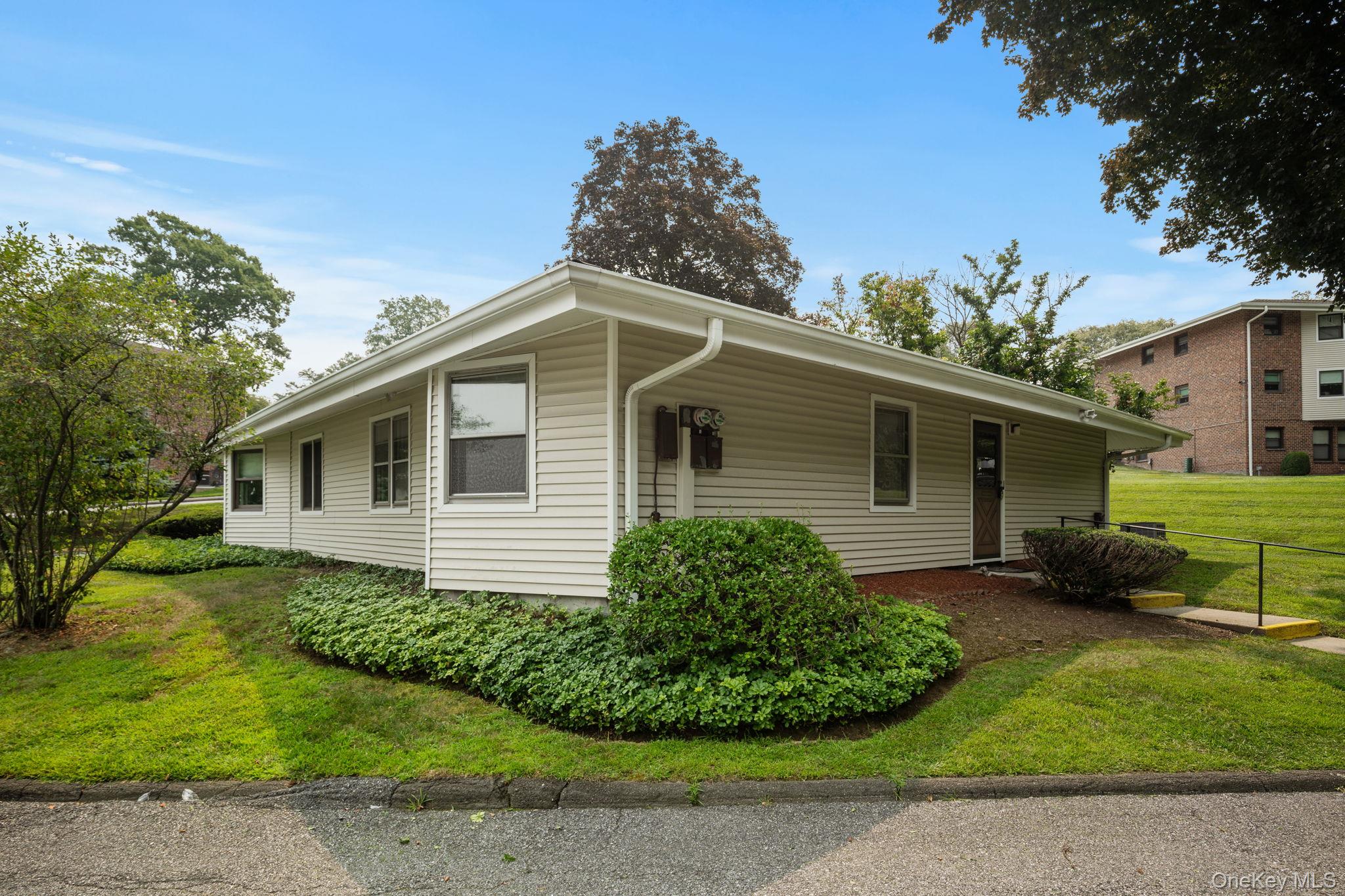 Discover the ideal blend of privacy and convenience in this rare Manor...