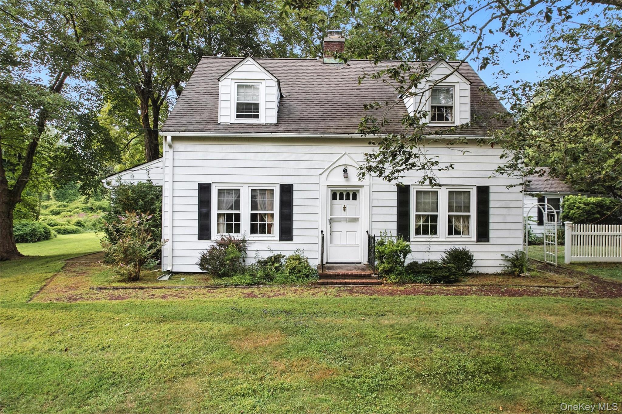 Situated on one glorious acre in Katonah, this charming 3 bedroom home...