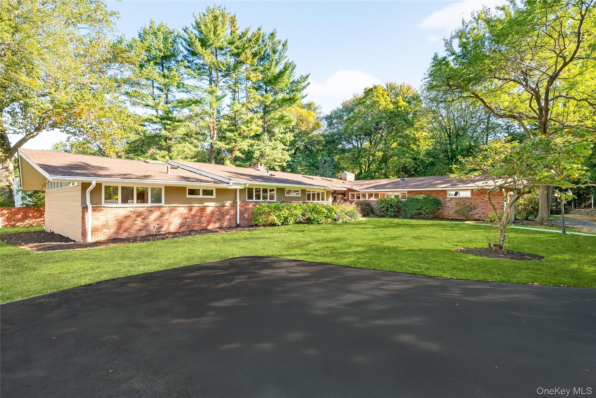 “Home in Hartsdale” Welcome to this beautifully maintained mid-century...