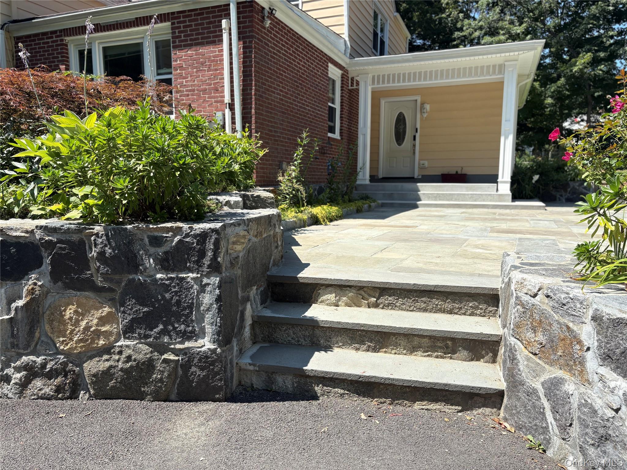 One of a kind- 2 bedroom 2 bath lives like a single family, garage lon...