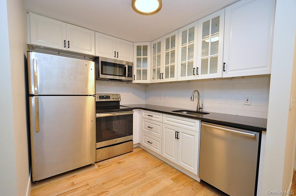 Welcome to Woodland Hills Condominium! This beautifully renovated 1-be...