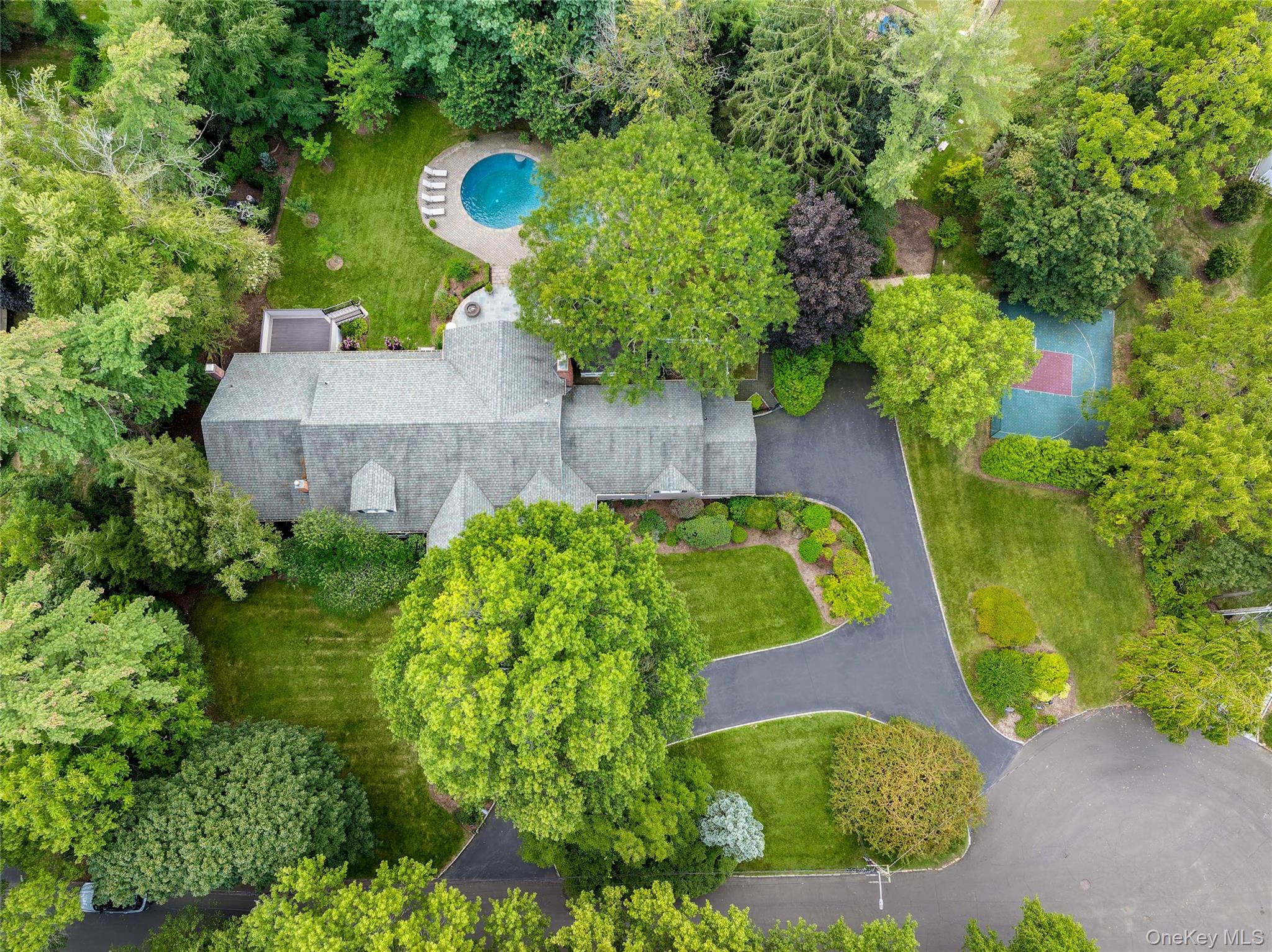 Nestled on a serene double cul-de-sac, this sprawling ranch sits on ju...
