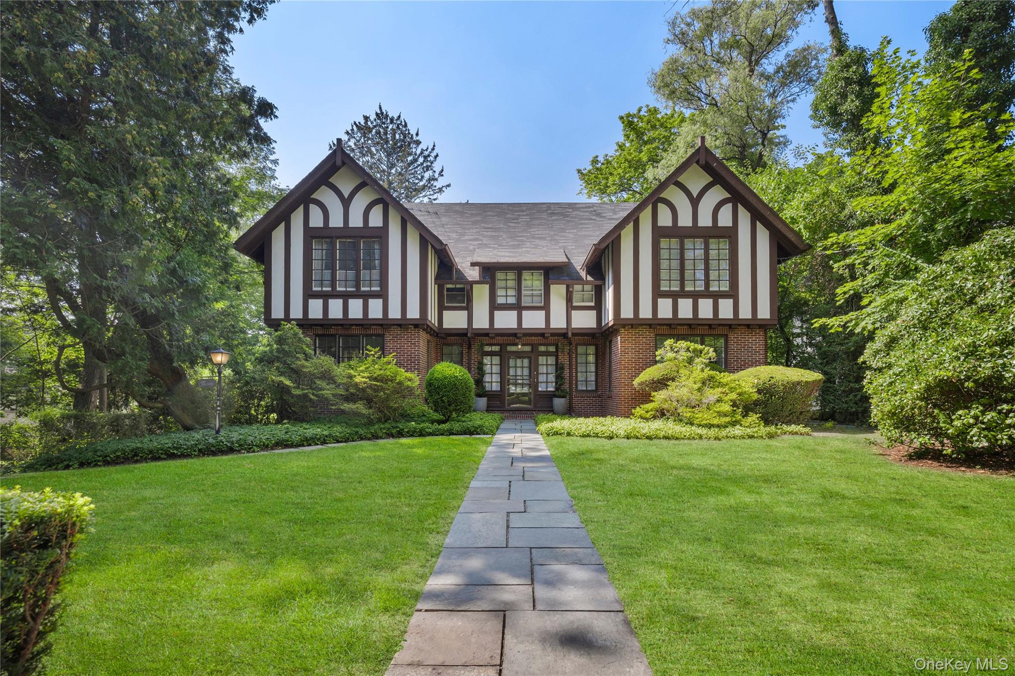 A Timeless Tudor, Beautifully Reimagined for Modern Living

Set on a s...