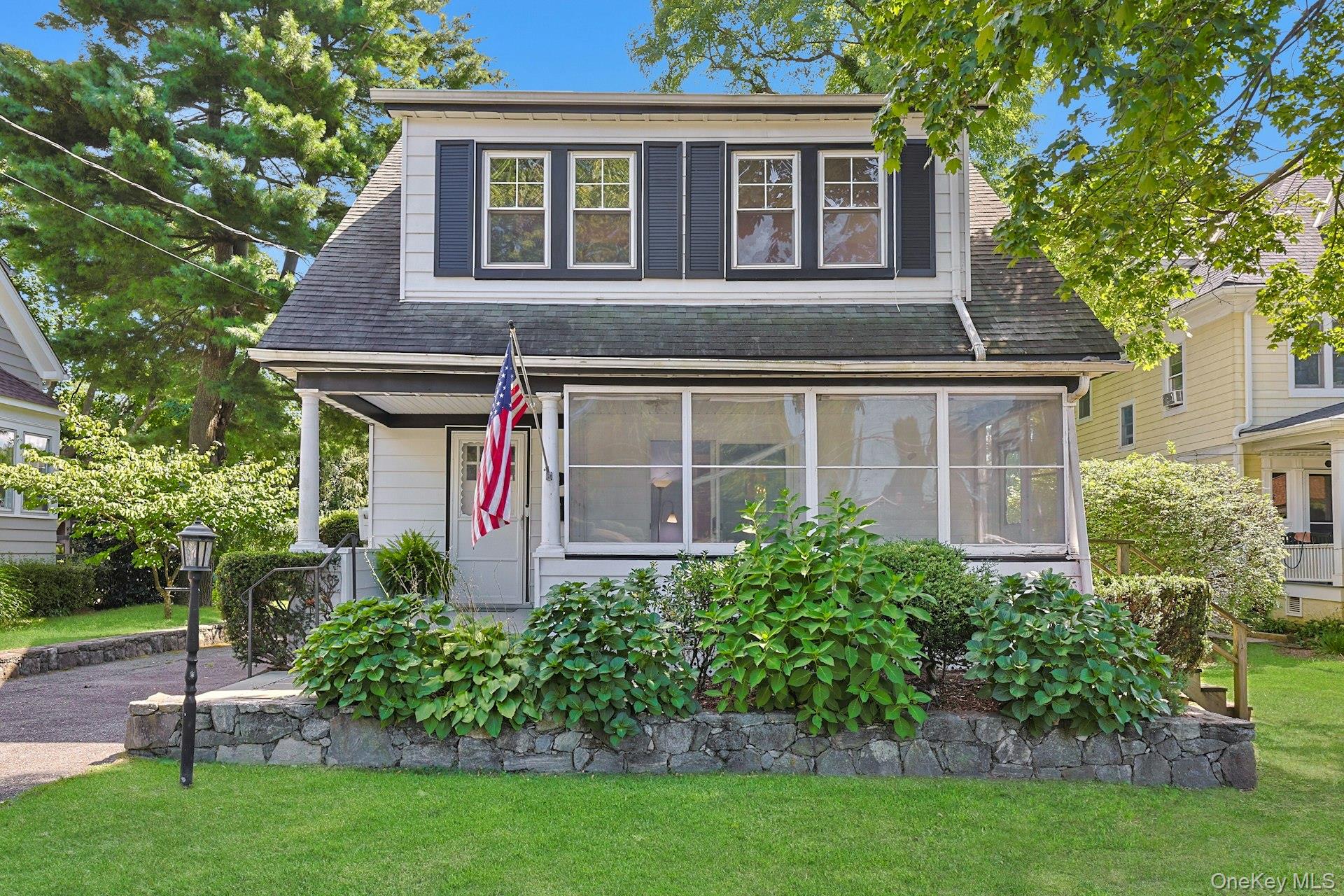 Charming 1917 Colonial boosts 4 Bedrooms with 1-1/2 Baths with welcomi...