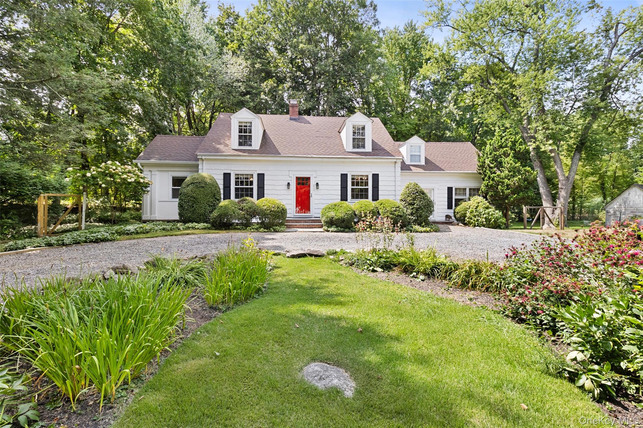 Enjoy easy living in this fully renovated Cape Cod style home situated...