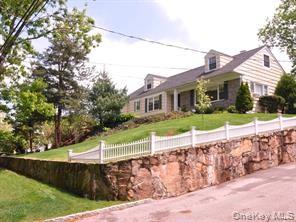 Charming Cape features 4 bedrooms, 3  bathrooms, hardwood floors, dini...