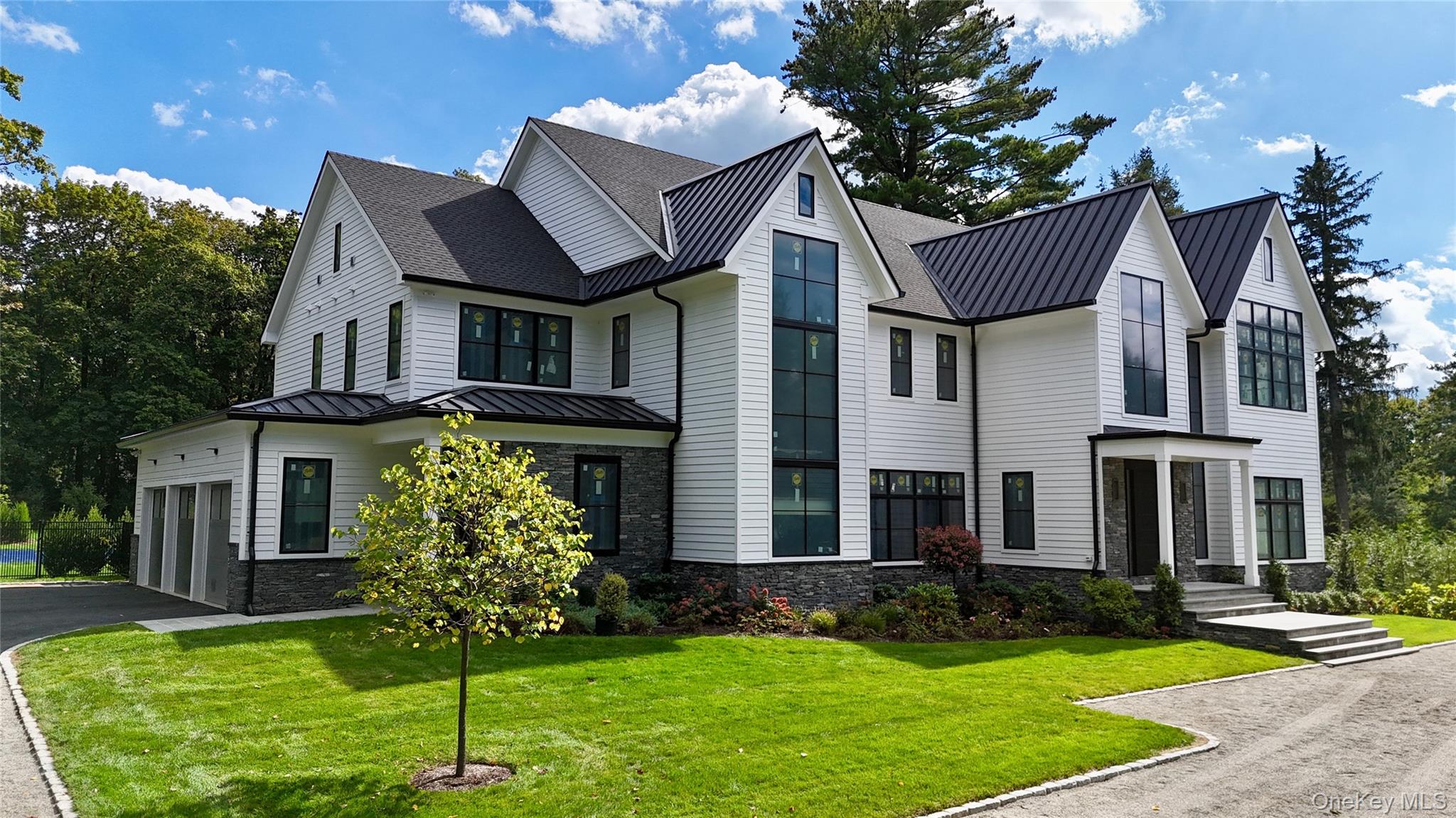 Stunning new construction by award winning custom luxury home builder,...