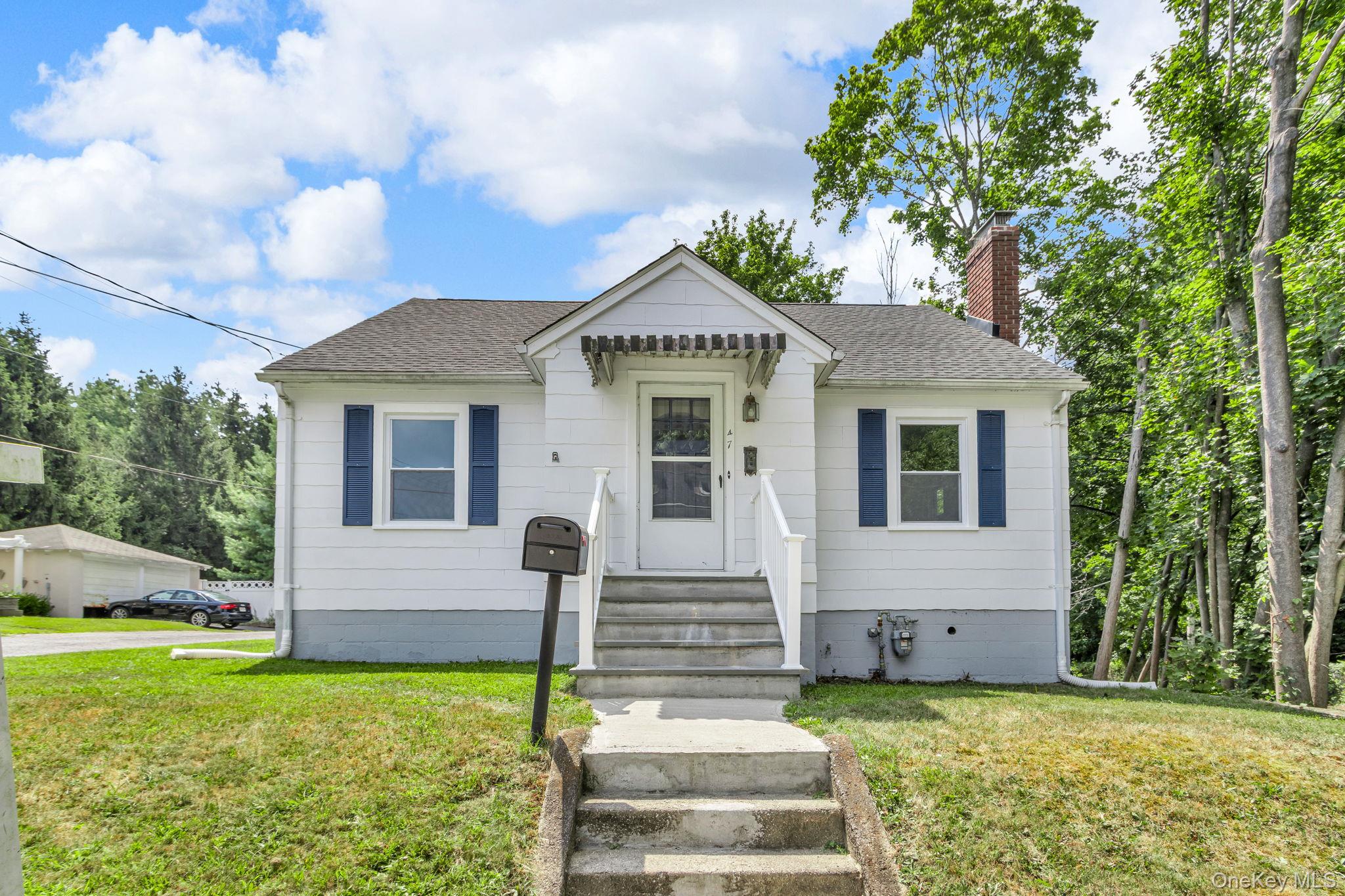 Explore this charming cape style house offering a blend of old-world c...