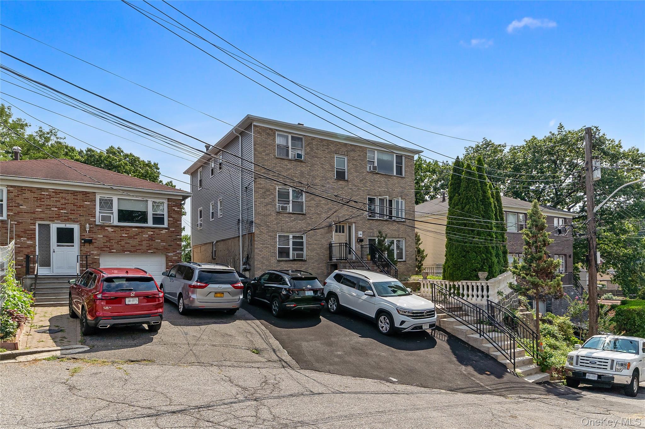 Welcome to 8 Elicar Terrace, a stunning brick Colonial duplex nestled...