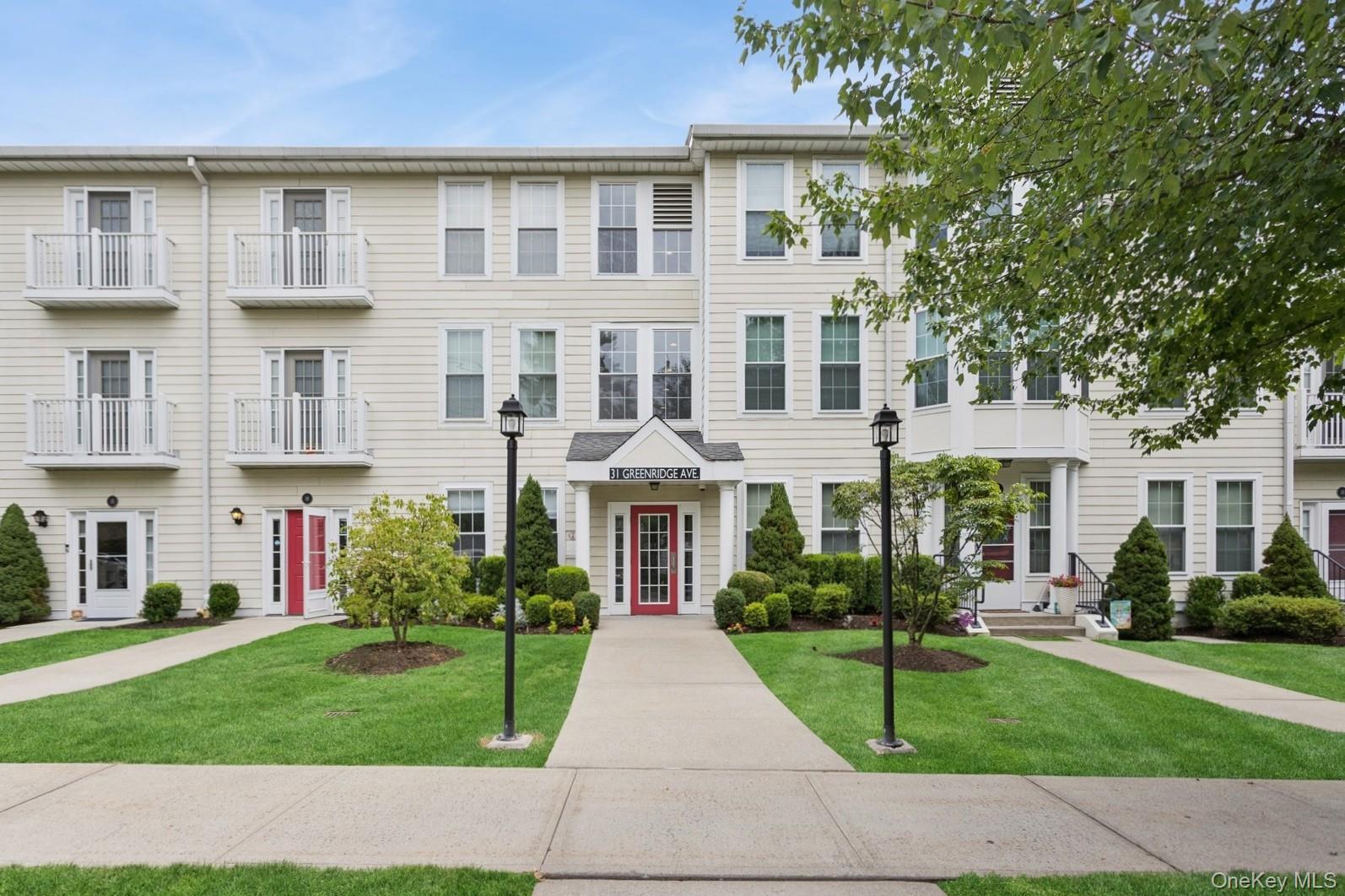 A top-floor 2 bedroom unit at Jefferson Place Low Rise building offeri...
