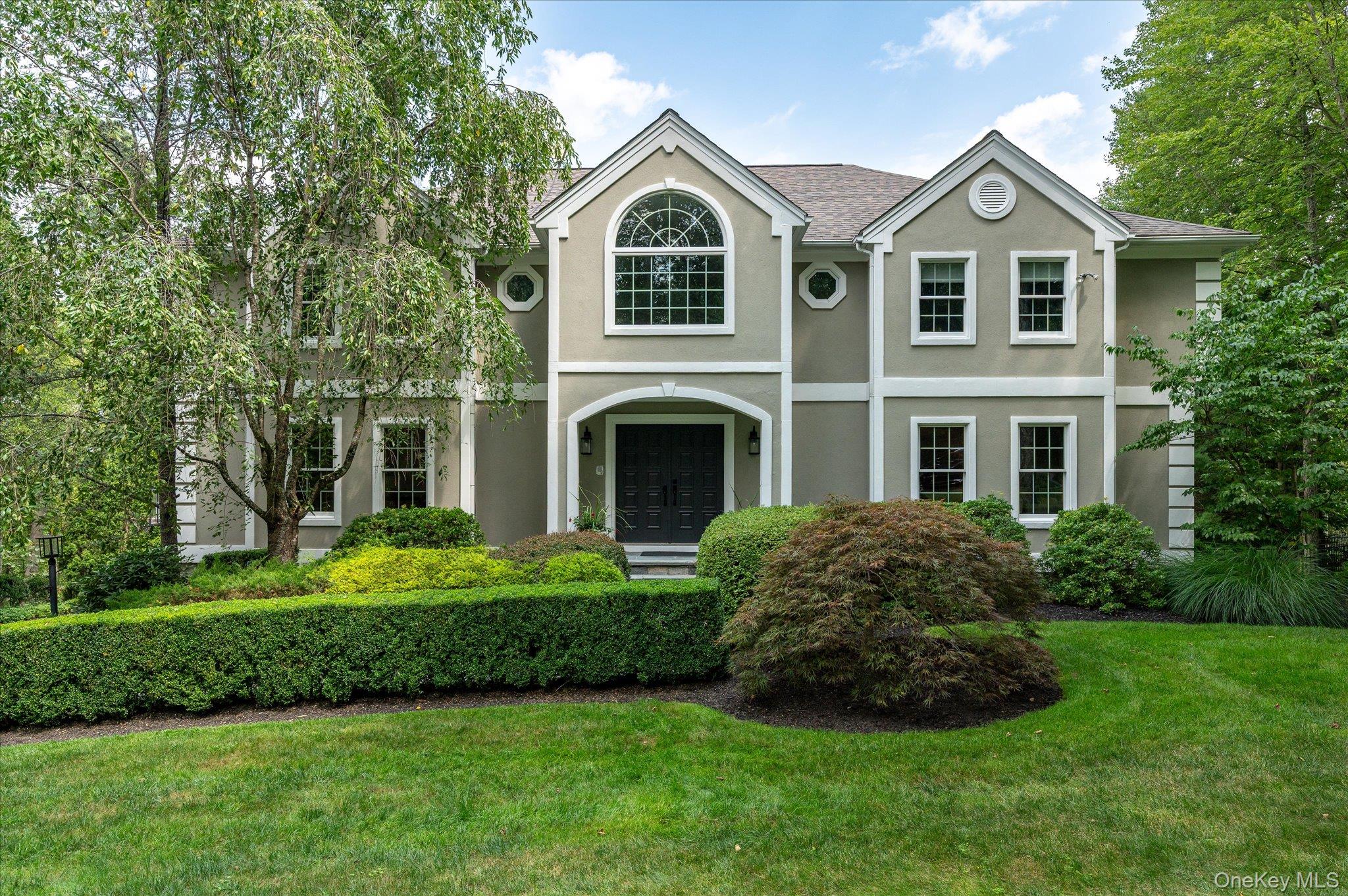 Tucked away on a quiet cul-de-sac in the highly coveted Orchard Hill n...