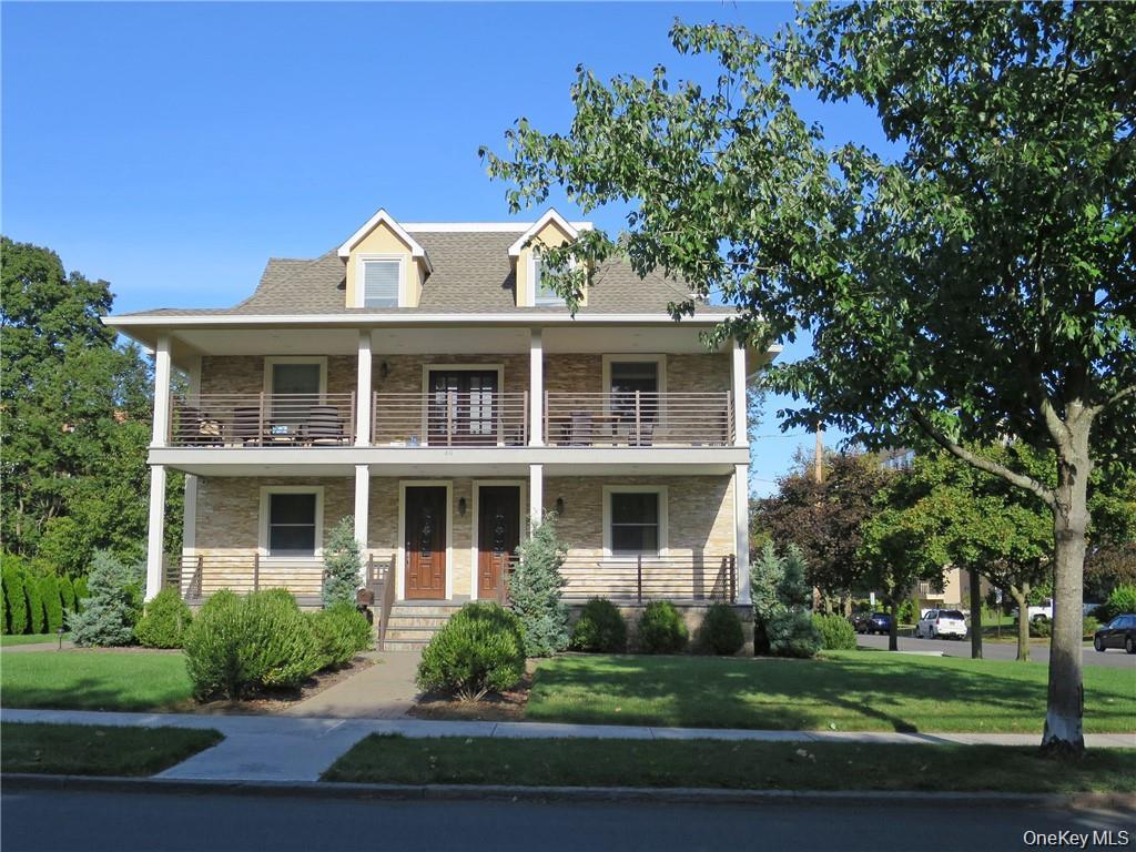 Looking for a prime investment opportunity? This luxurious two-family...
