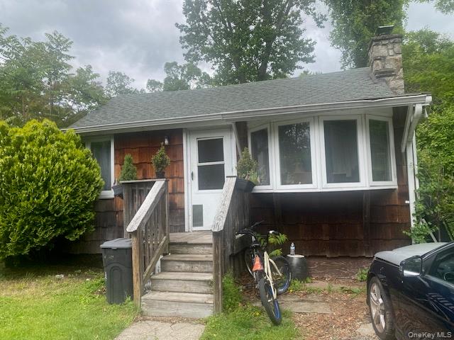 Nestled in the heart of Lake Peekskill, this cozy two-bedroom, one-bat...