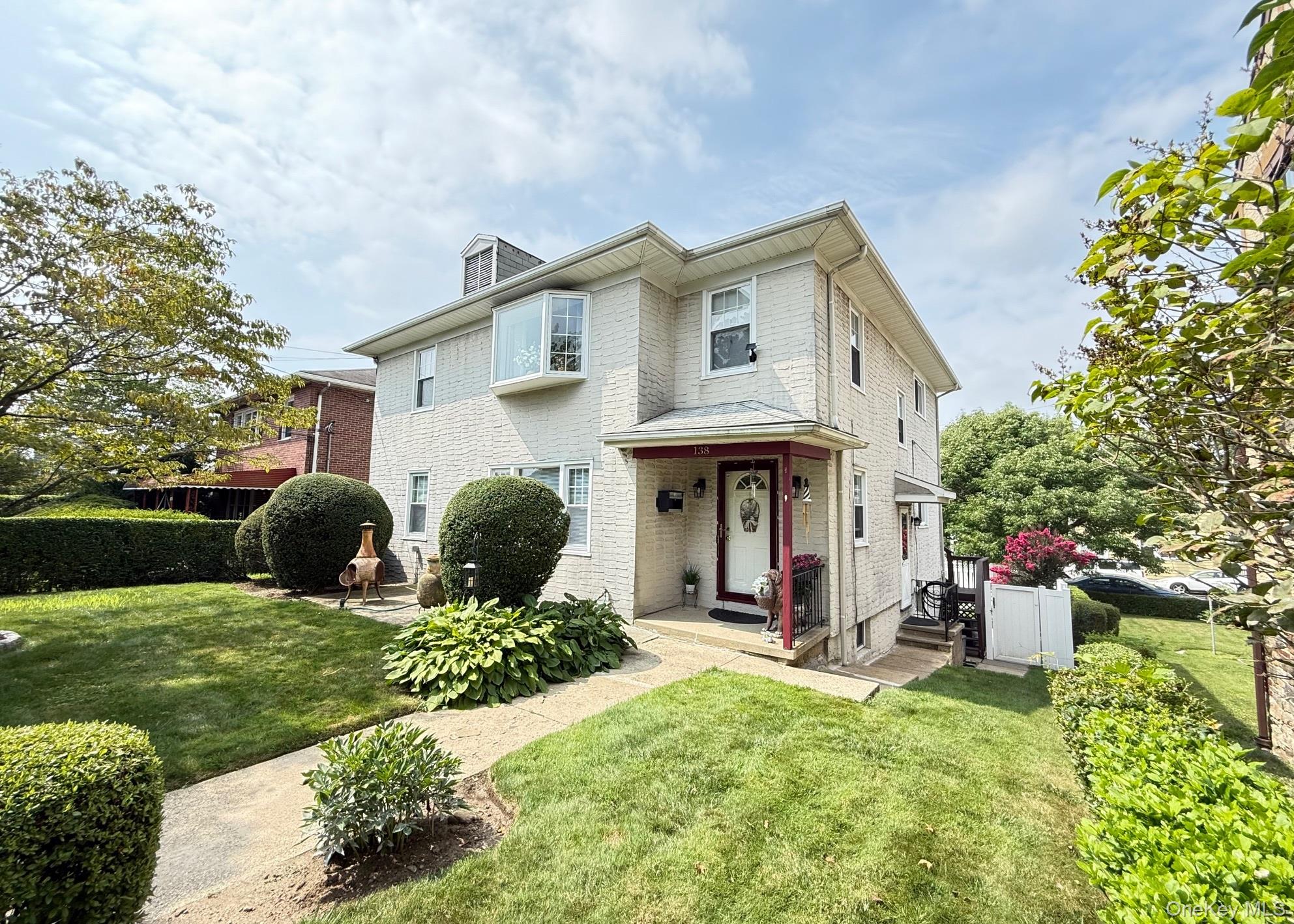 This spacious first-floor, two-bedroom unit in a well-maintained two-f...