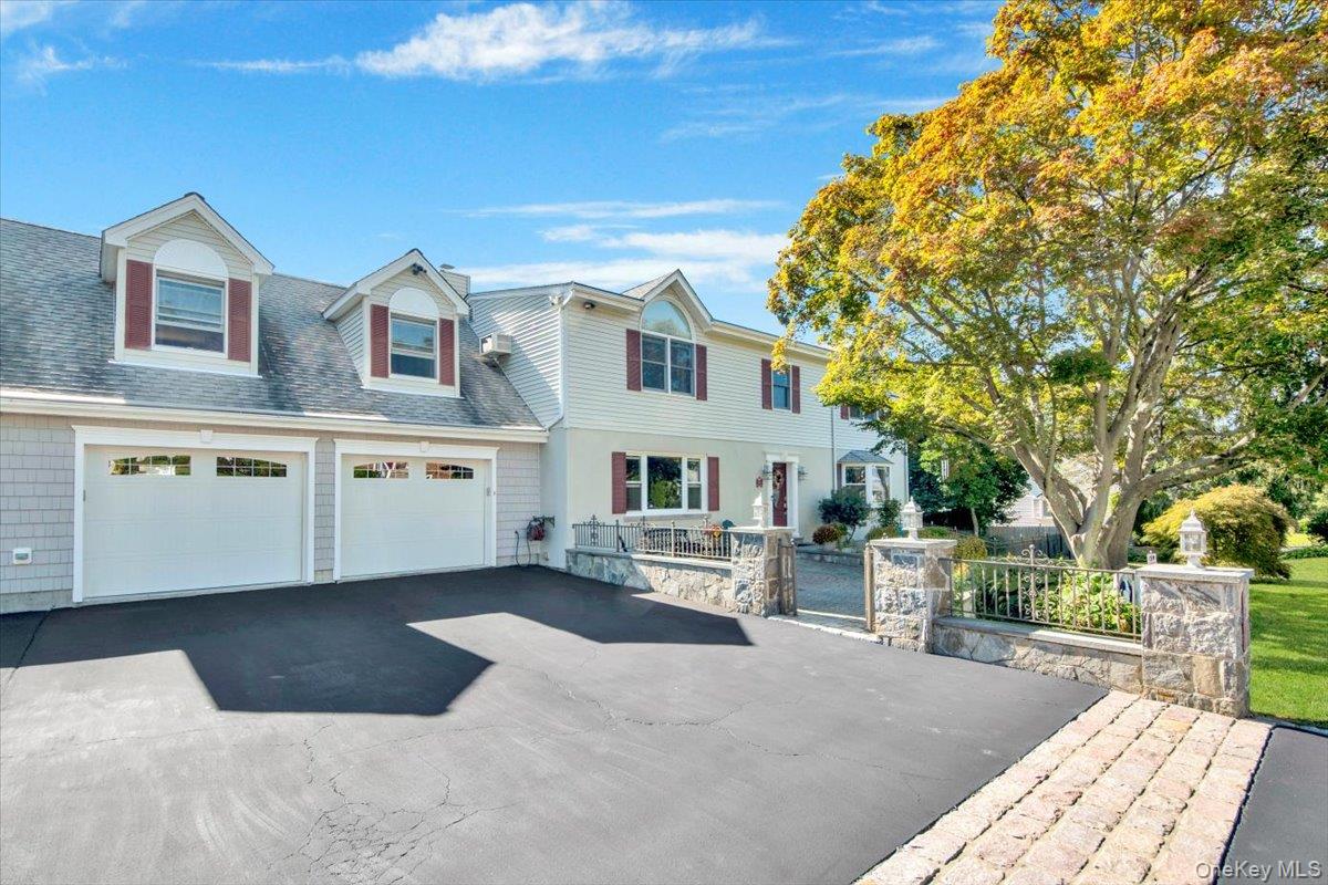 Welcome home to 211 Willis Ave!  Stylishly expanded and lovingly maint...