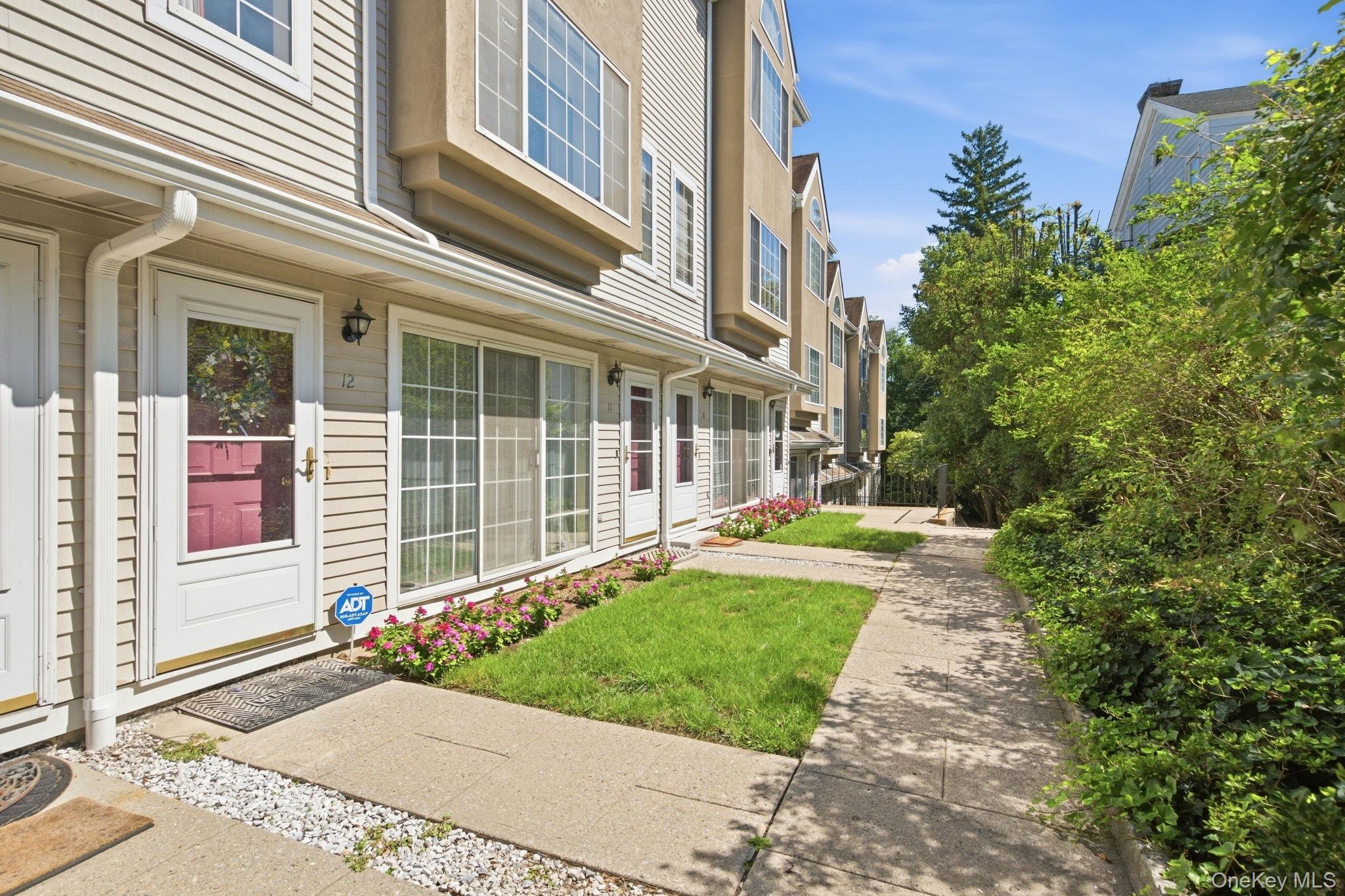 Tucked into Village Commons on a quiet one-way street, this two-bedroo...