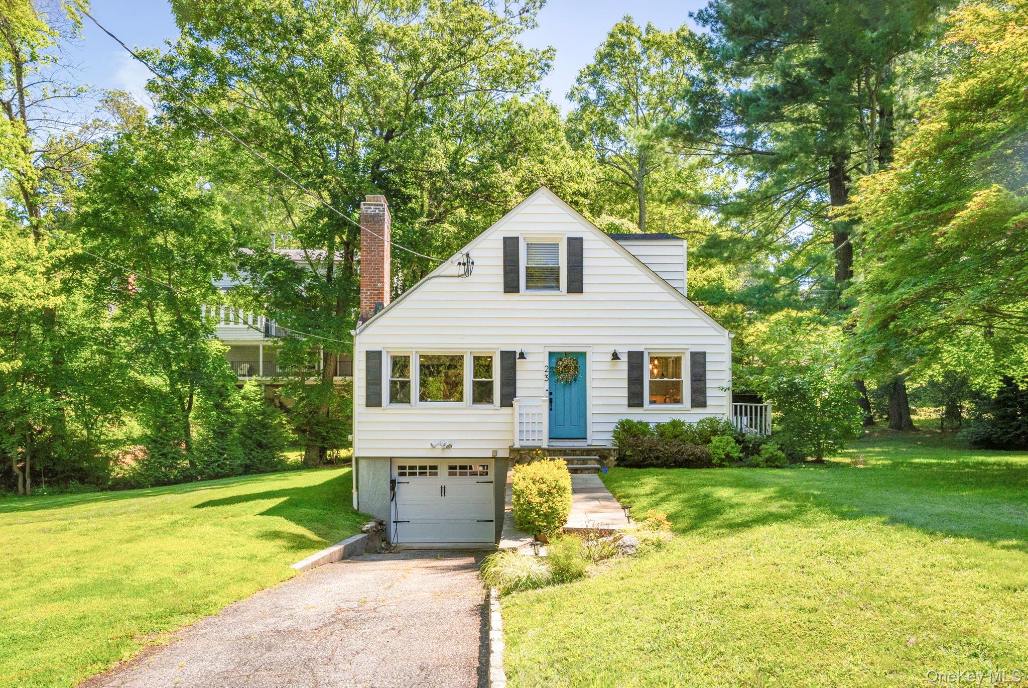 Welcome to 23 Brookside Place in Pleasantville, NY — a beautifully mai...
