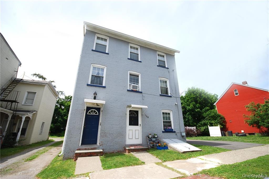 This five-unit apartment building is a cash cow. This free-market mult...