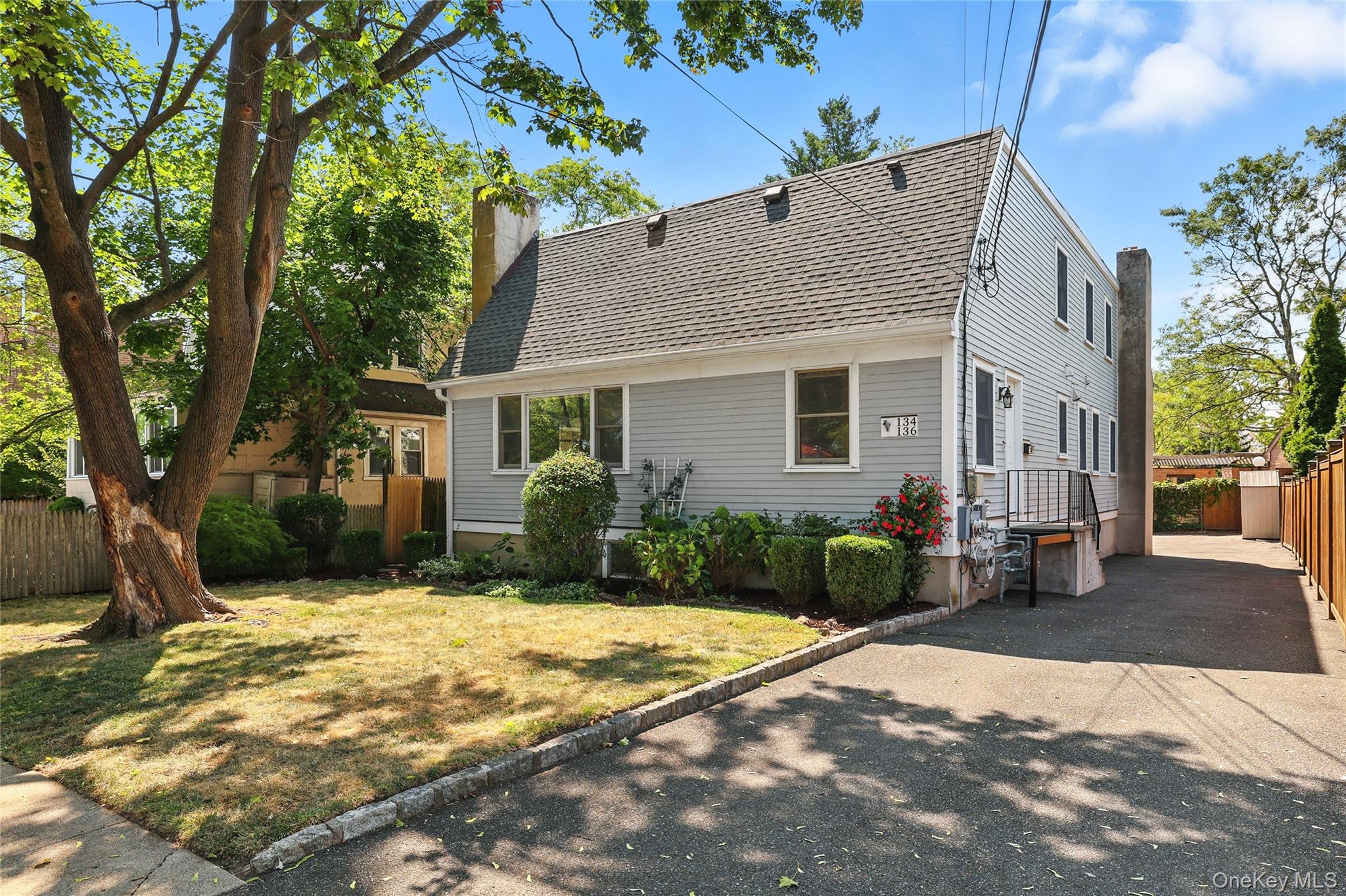 A gem of a recently built two-family home within half a block to Long...