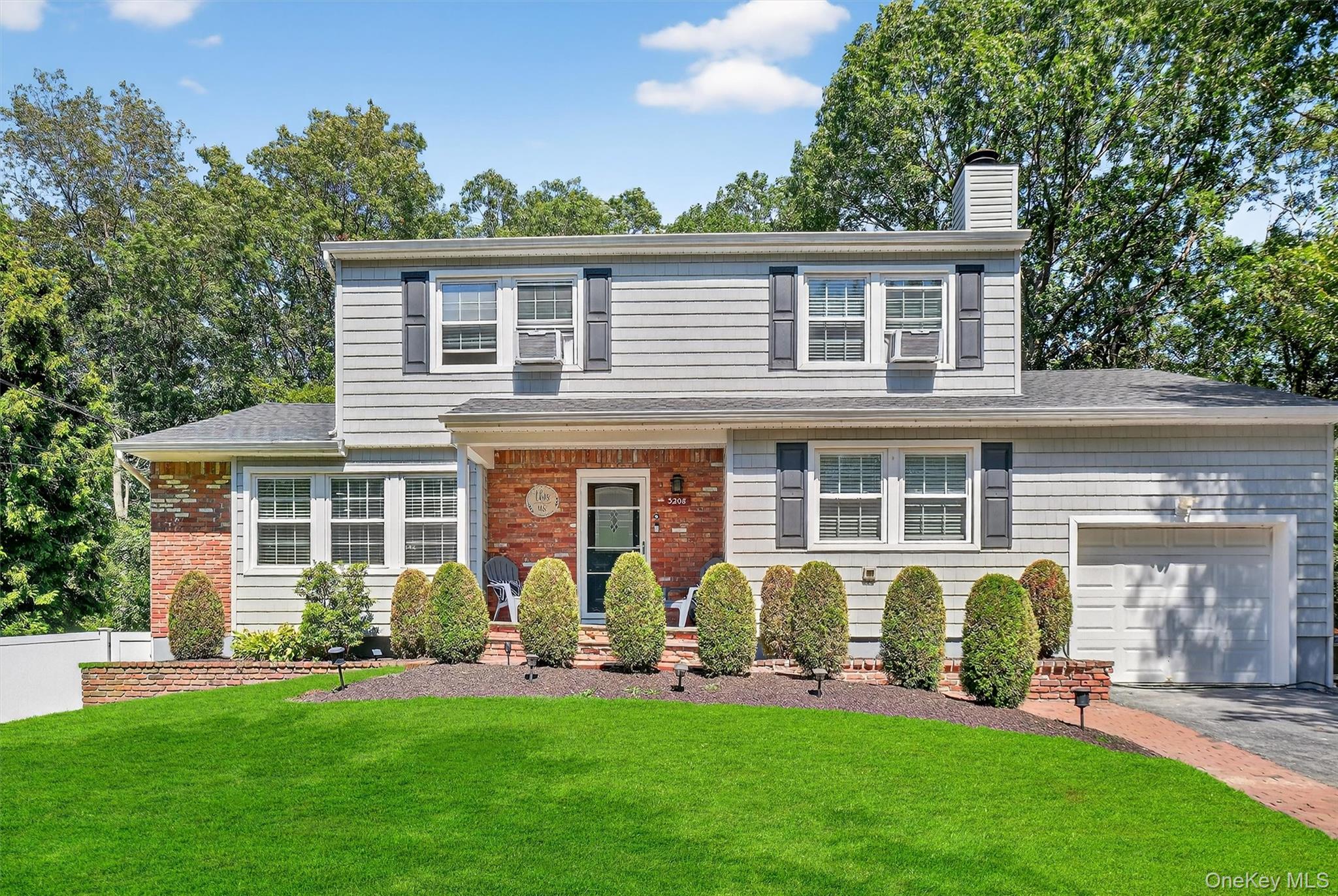 Discover this charming Colonial-style home nestled on a peaceful cul-d...