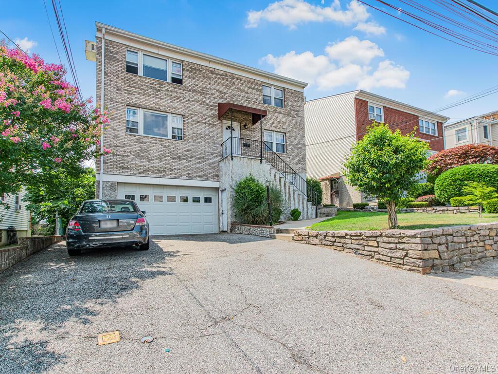 Introducing 55 AKA 57 Mansion Avenue.  This bright and spacious 2 fami...