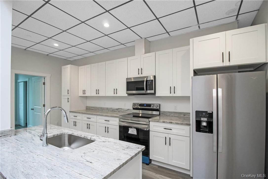 This spacious apartment offers modern comfort with classic charm, just...