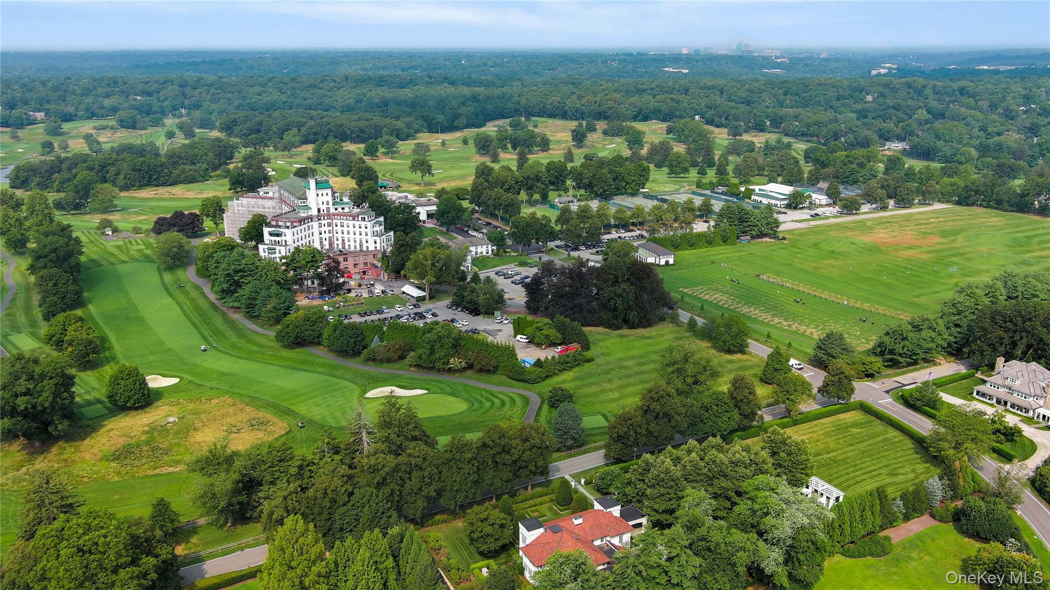 Iconic and admired Westchester Country Club gem on prime double lot wi...