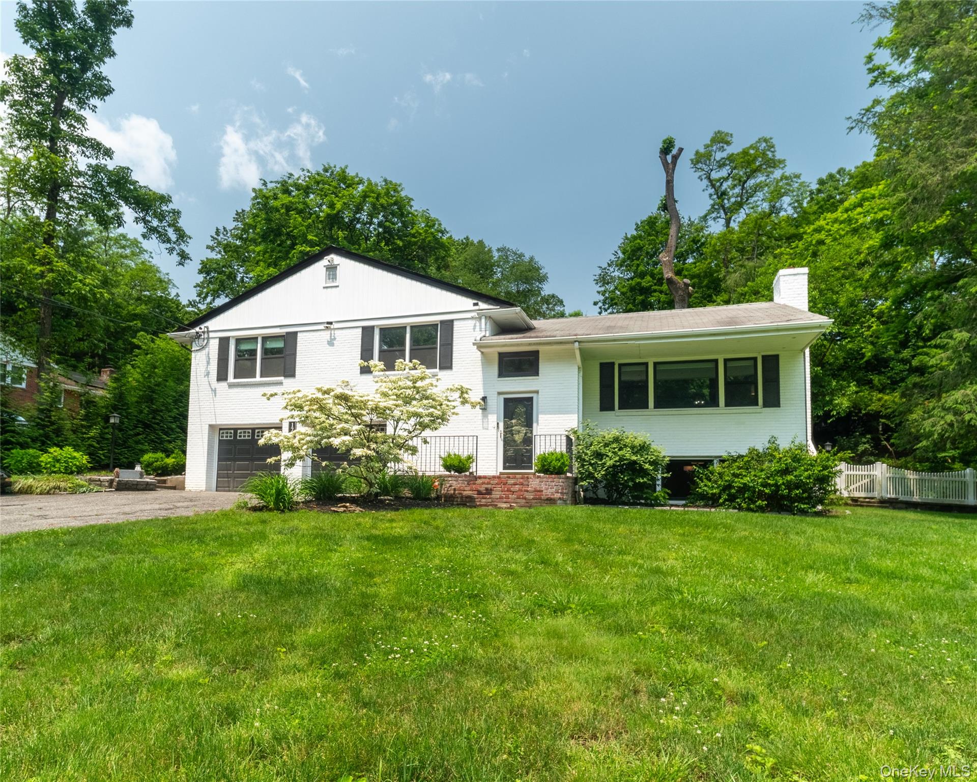 Beautiful home on .83 acre of majestically landscaped Property. Home o...