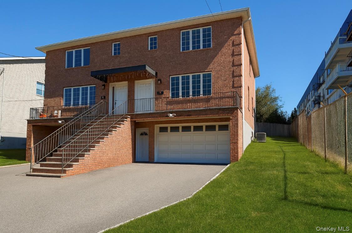 Bright 3-Bedroom Duplex with Garage Parking – Walk to Schools & Shops!...